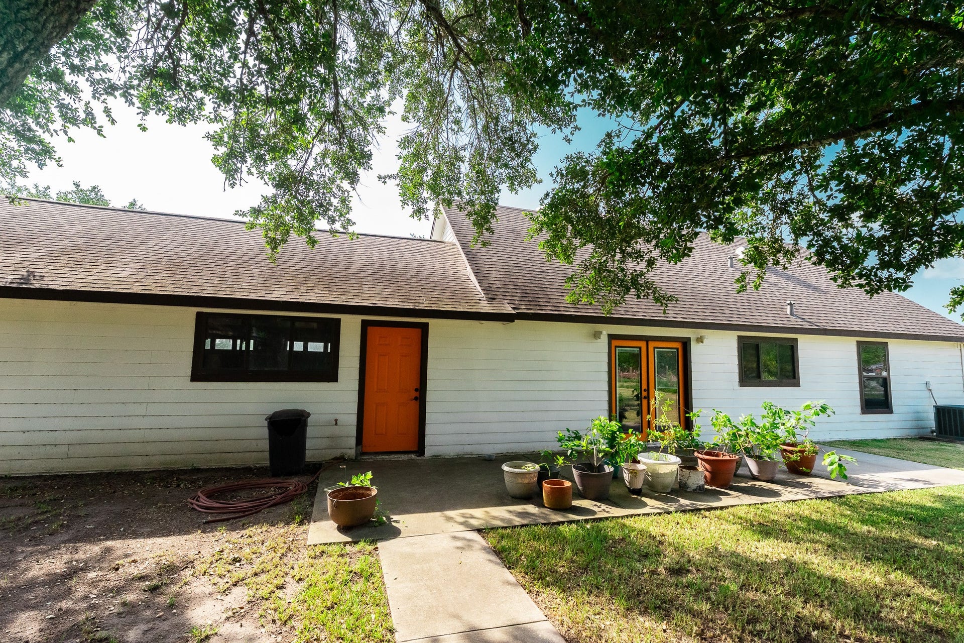 3015 Indian Acres Street, Alvin, TX 77511 The back of the home. Notice the large patio.