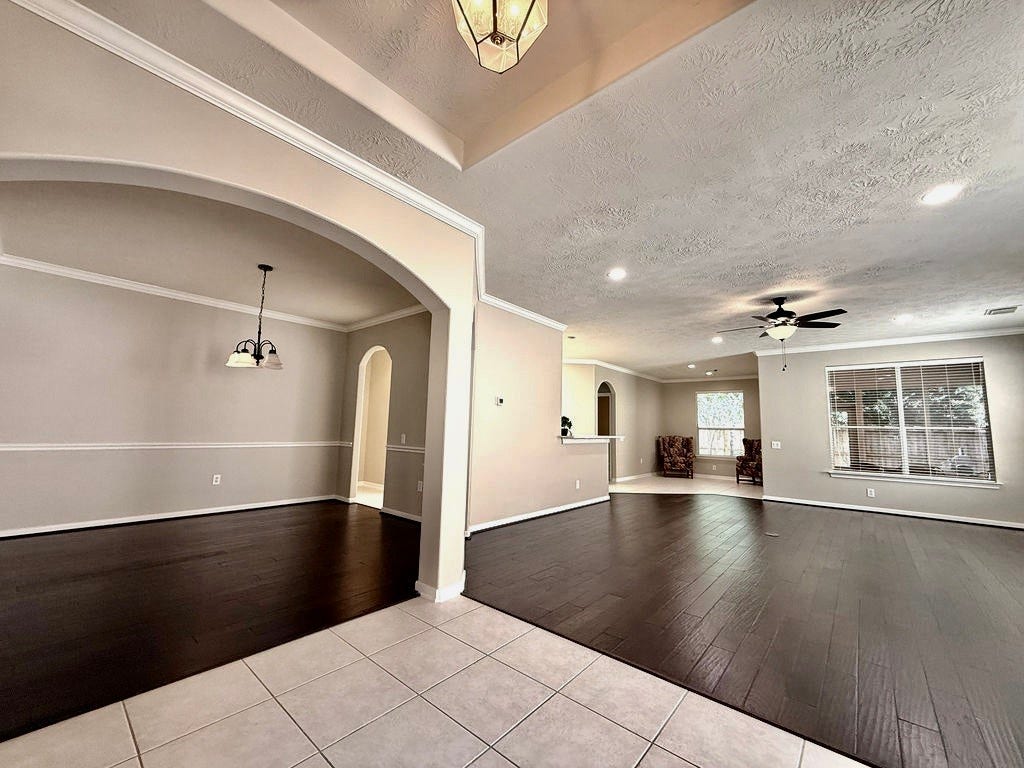 90 Country Gate, Conroe, TX 77384 Formal dining room open to living room