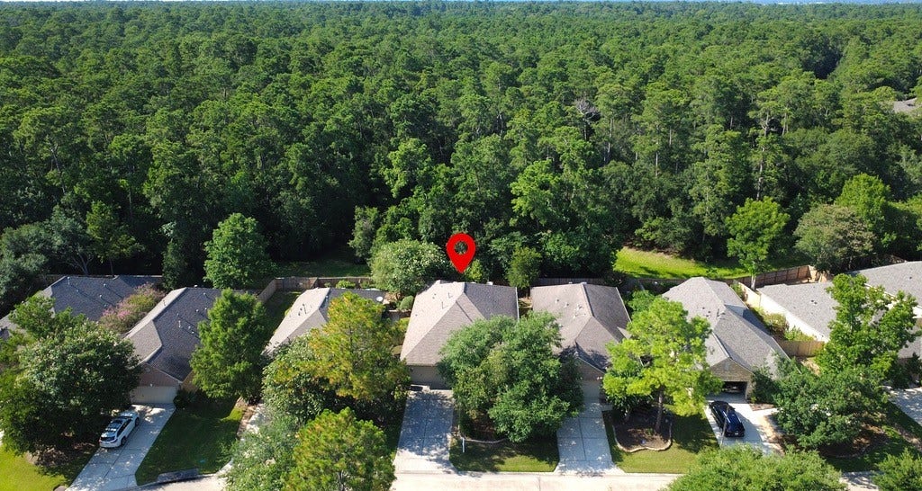 90 Country Gate, Conroe, TX 77384 This home backs to Jones State Park for added peace and quiet and privacy