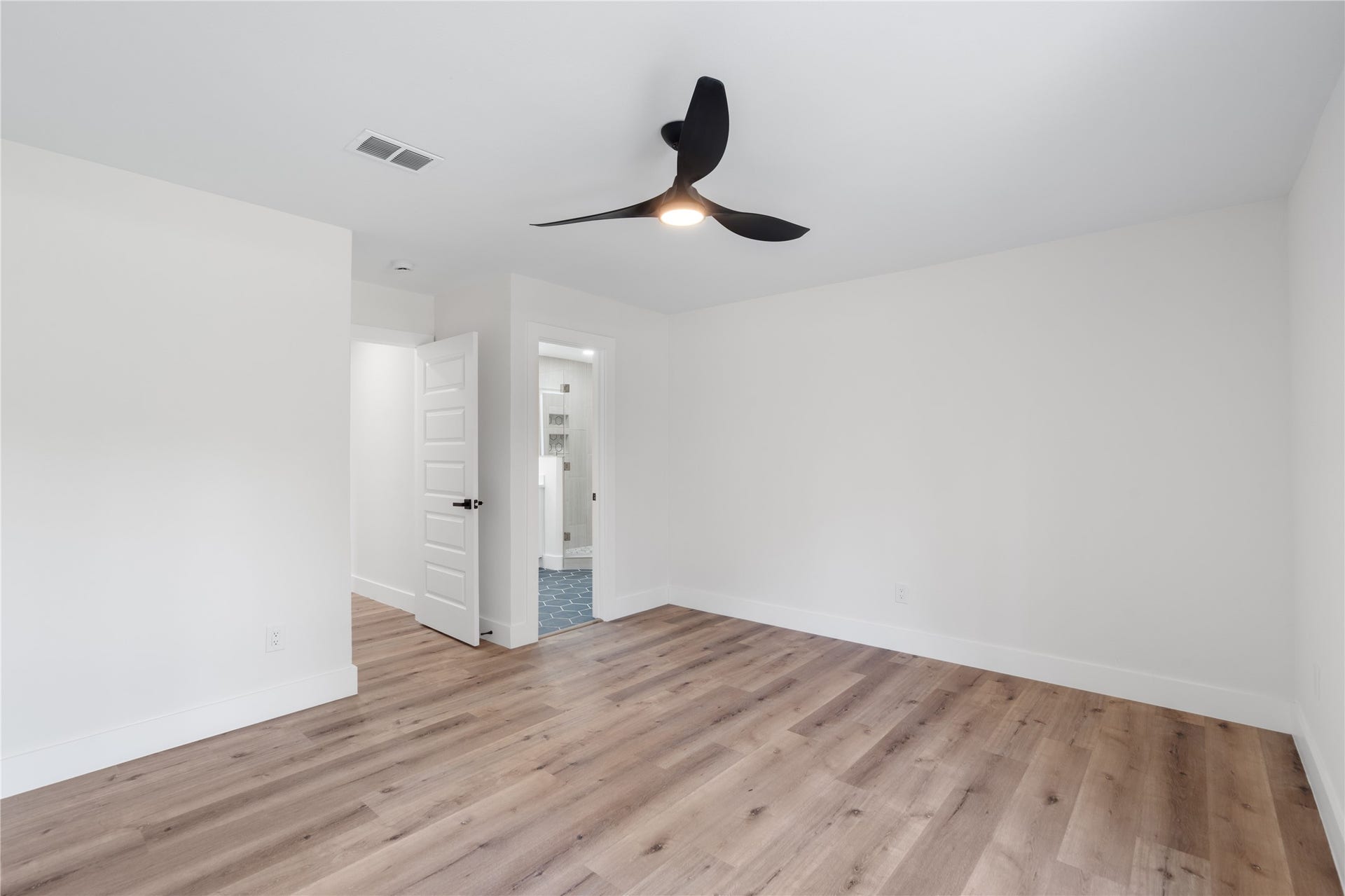 12019 Beth Lane, Magnolia, TX 77354 Another view of the primary retreat fit for a King size bed! NO CARPET is always a bonus.