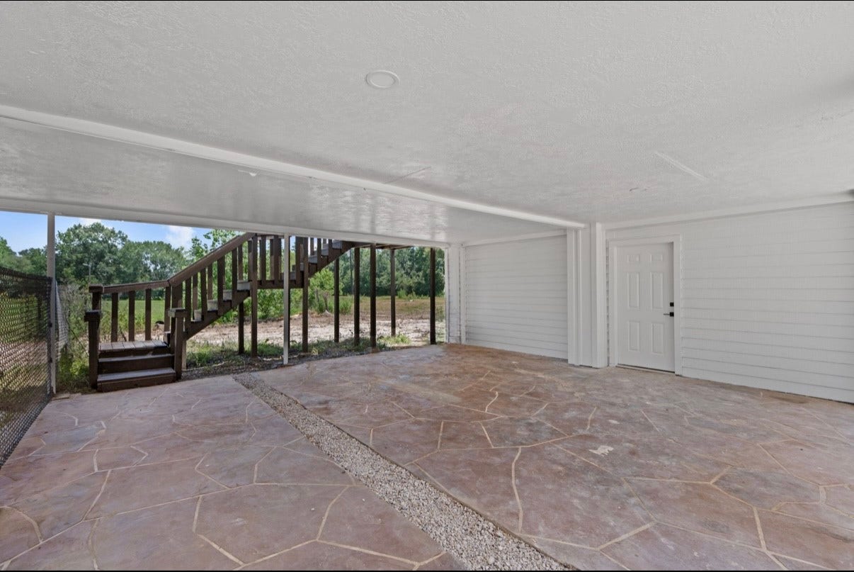 12019 Beth Lane, Magnolia, TX 77354 2 Car covered carport, Led Recessed Lighting, 800 sq ft garage apartment on top. Separate meter if you want to rent out. 1/2 bath and storage area, plummed for a shower.