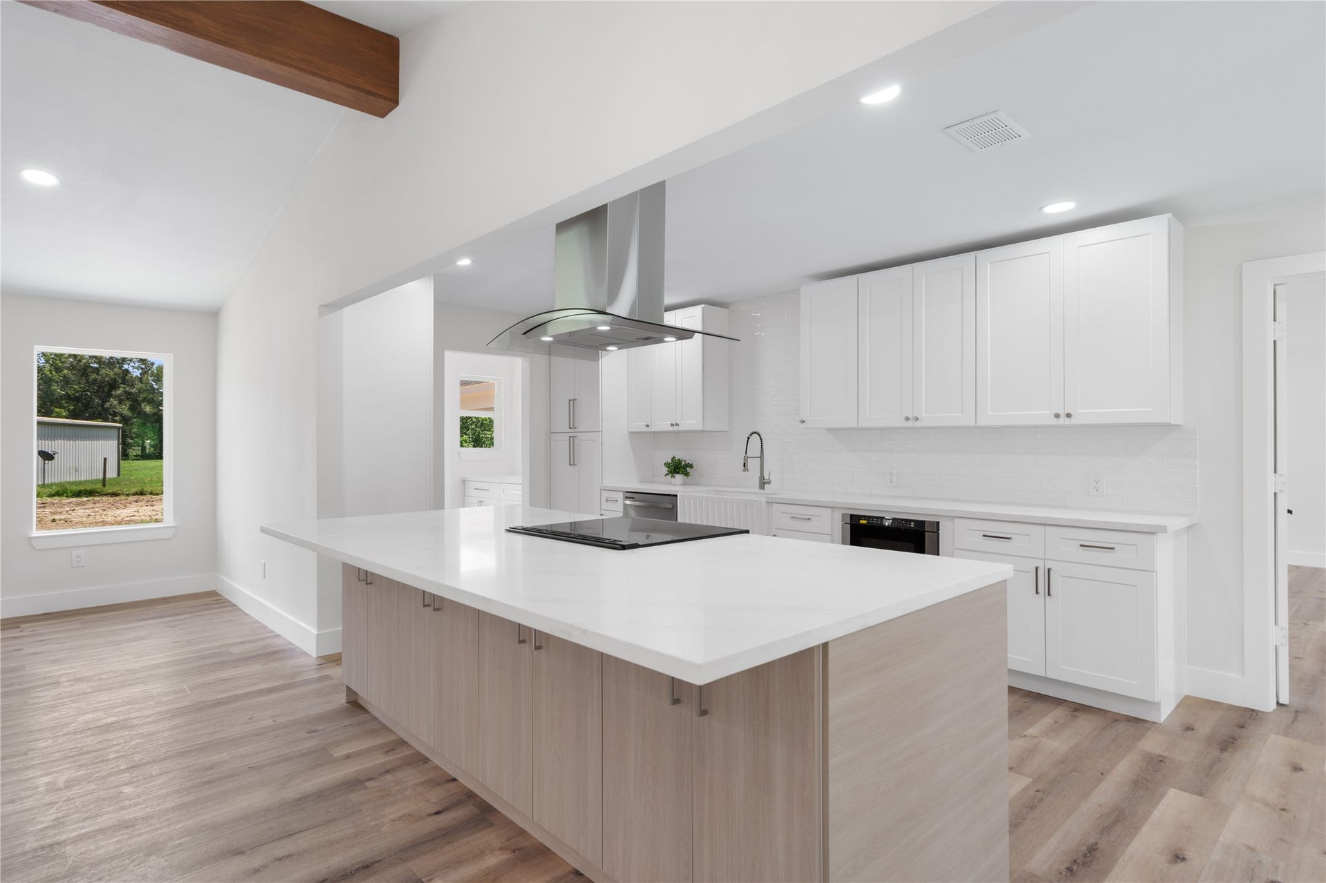 12019 Beth Lane, Magnolia, TX 77354 This impressive kitchen is the perfect space for hosting dinners and entertaining.
