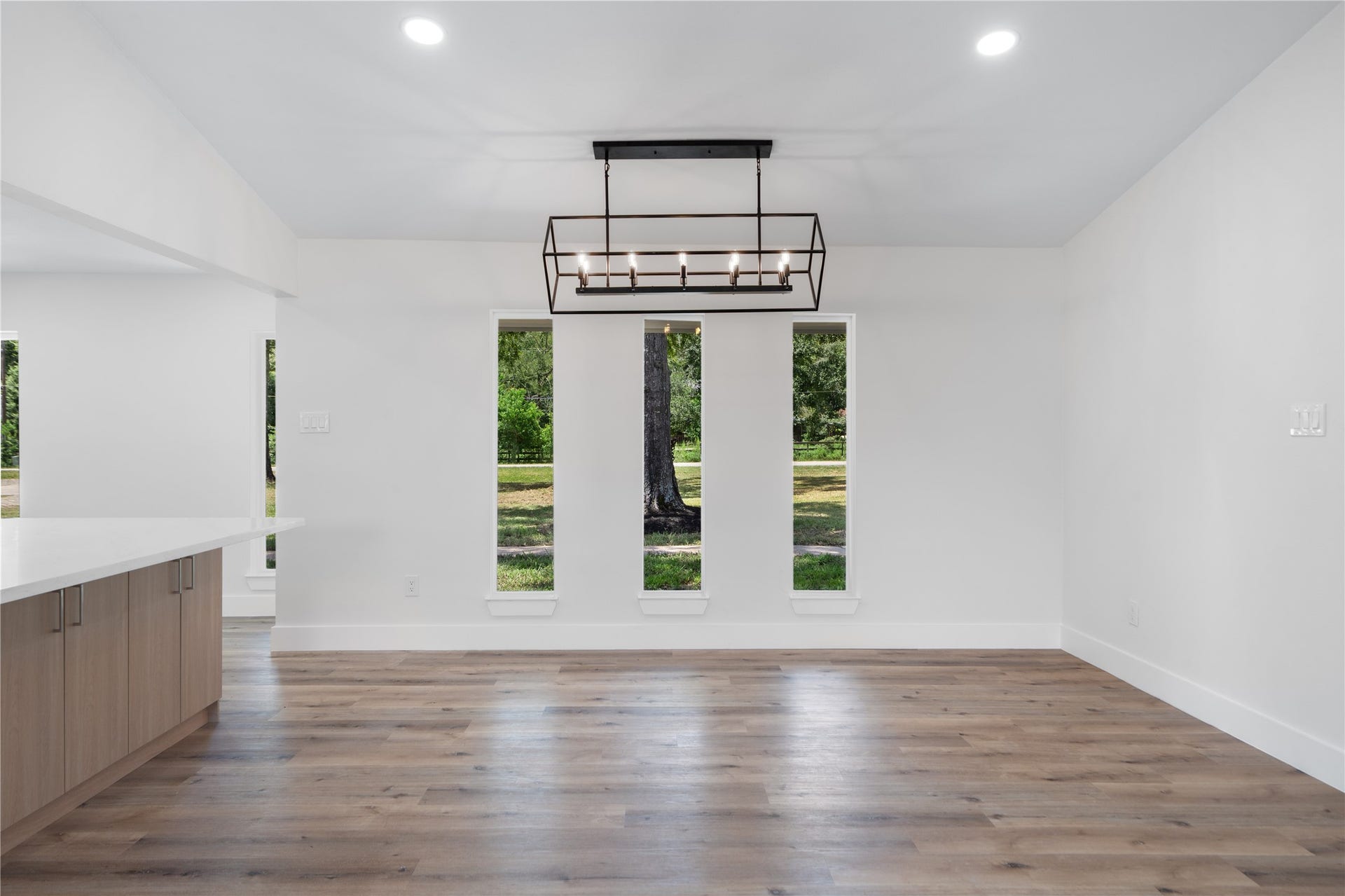 12019 Beth Lane, Magnolia, TX 77354 Views from the great room looking to the dinning area and breakfast bar. One huge open layout for pure enjoyment and entertaining.