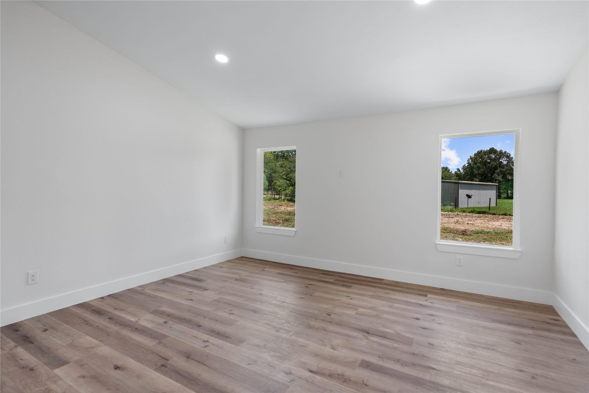 12019 Beth Lane, Magnolia, TX 77354 Just a section of the awe-inspiring living area with lots inviting natural light.