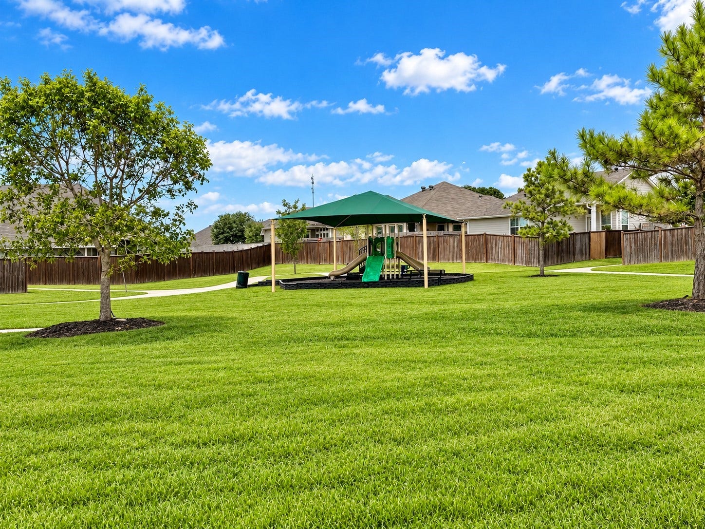 313 Brocks Court, Montgomery, TX 77356 Another view of the same park but this one showcases the abundant play space & walking paths included!
