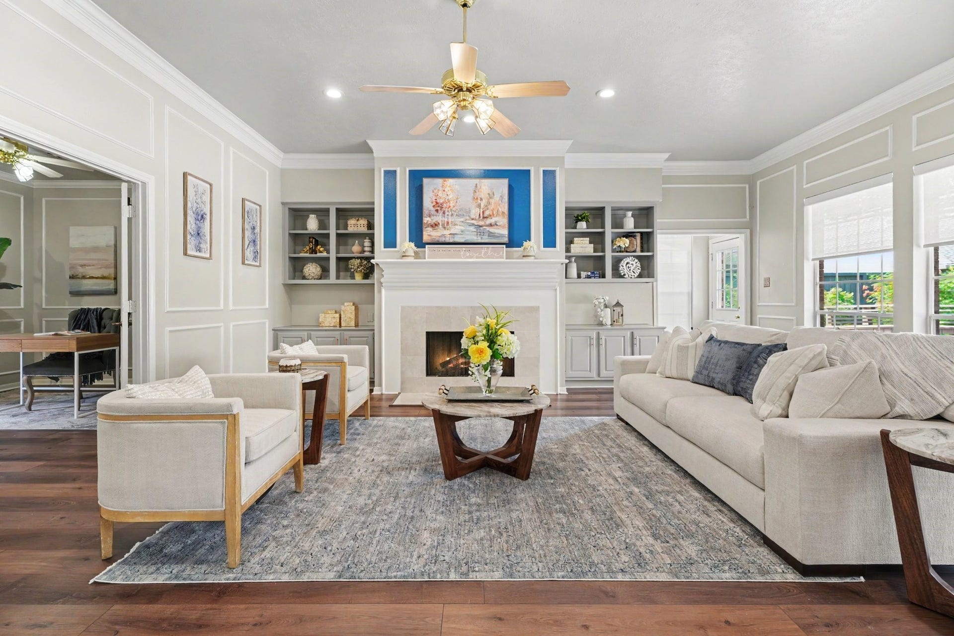 16507 Heather Meadow Court, Pasadena, TX 77059 Built-in bookshelves and cabinetry provide ample storage and charm to this beautiful space. Additionally, the expansive wall of windows fills the living room with bright, natural light.