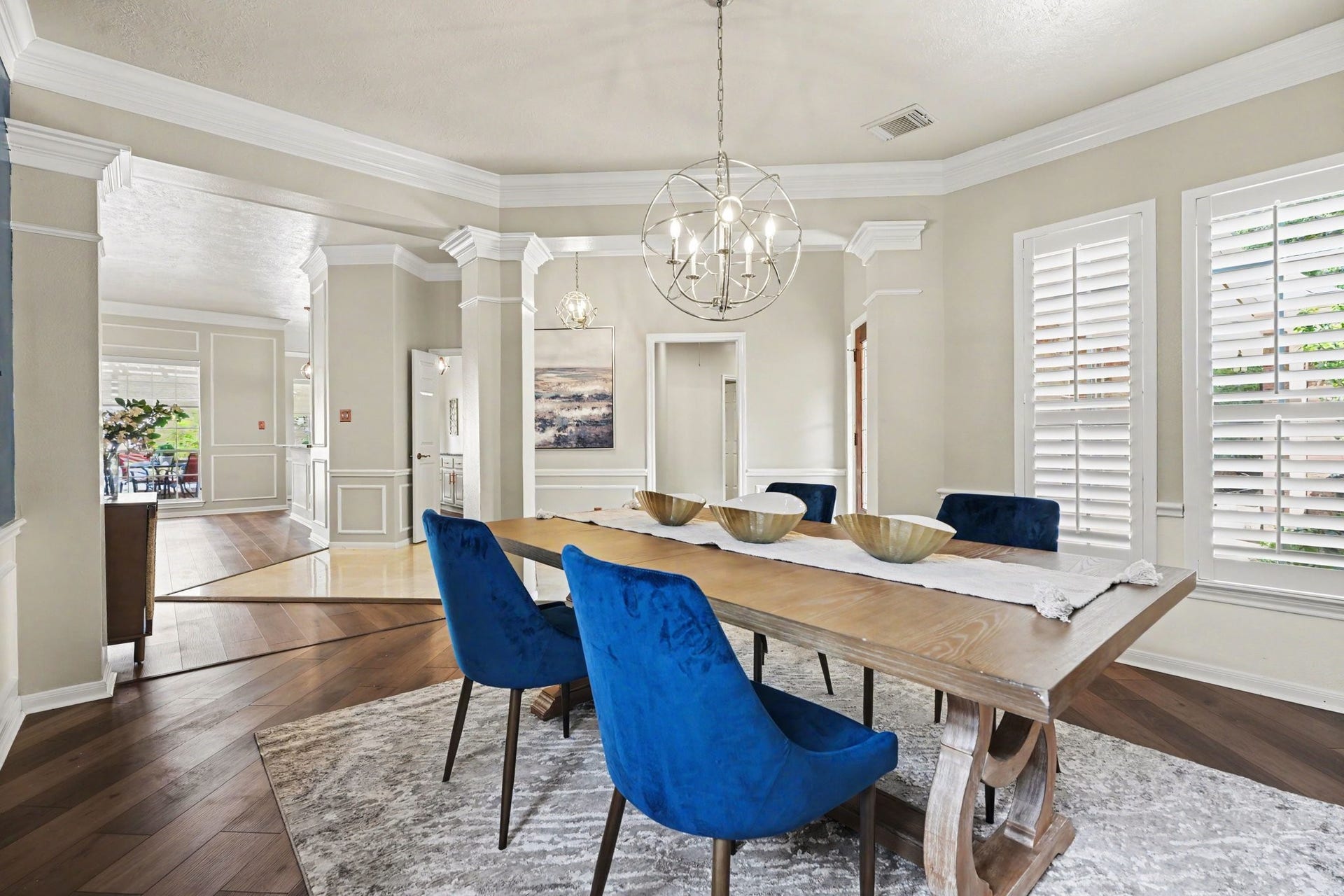 16507 Heather Meadow Court, Pasadena, TX 77059 Bright, modern, and beautifully on trend, this space pairs cool gray walls with striking pops of blue for a fresh, sophisticated look. Abundant natural light fills the room, enhancing the colors and creating an open, inviting atmosphere.