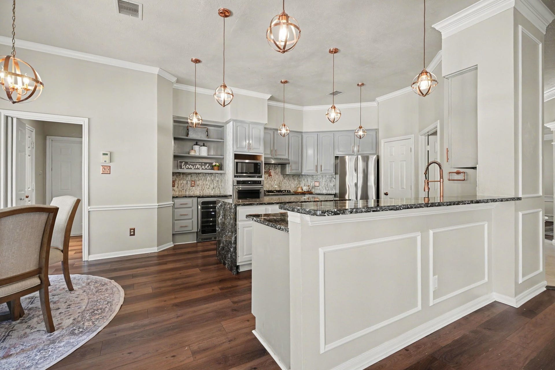 16507 Heather Meadow Court, Pasadena, TX 77059 This spacious breakfast bar comfortably accommodates four bar-height stools, providing perfect extra seating for guests during holiday gatherings.