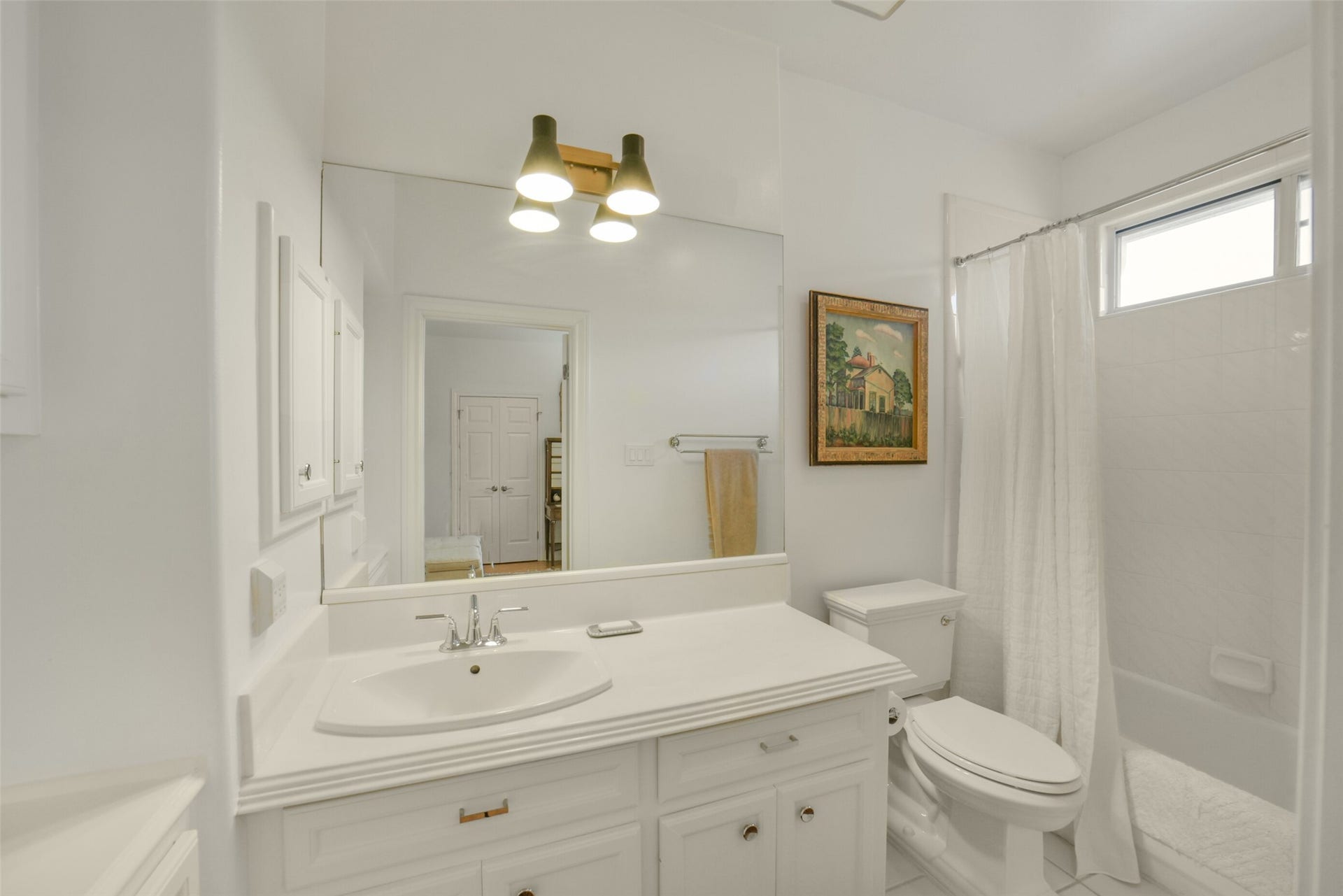 full bathroom connected to third floor secondary bedroom