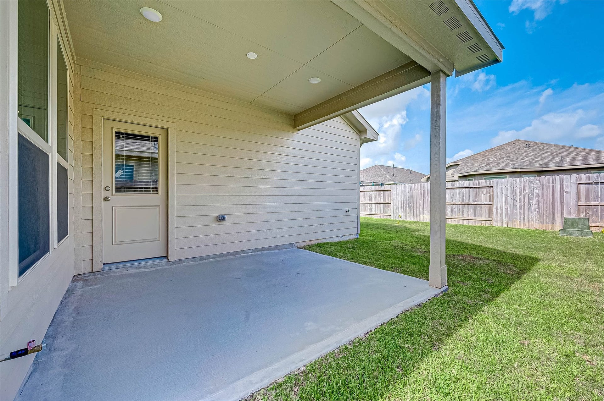 7914 Euphonia Glade Lane, Richmond, TX 77407 Covered backyard patio extends the living space outdoors and provides a great spot for relaxing or dining.