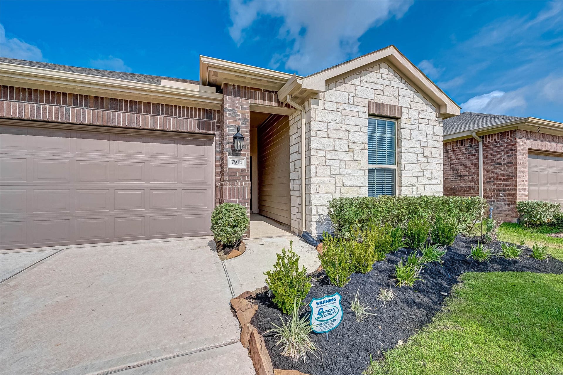 7914 Euphonia Glade Lane, Richmond, TX 77407 Inviting covered entry welcomes you into this comfortable and thoughtfully designed home.