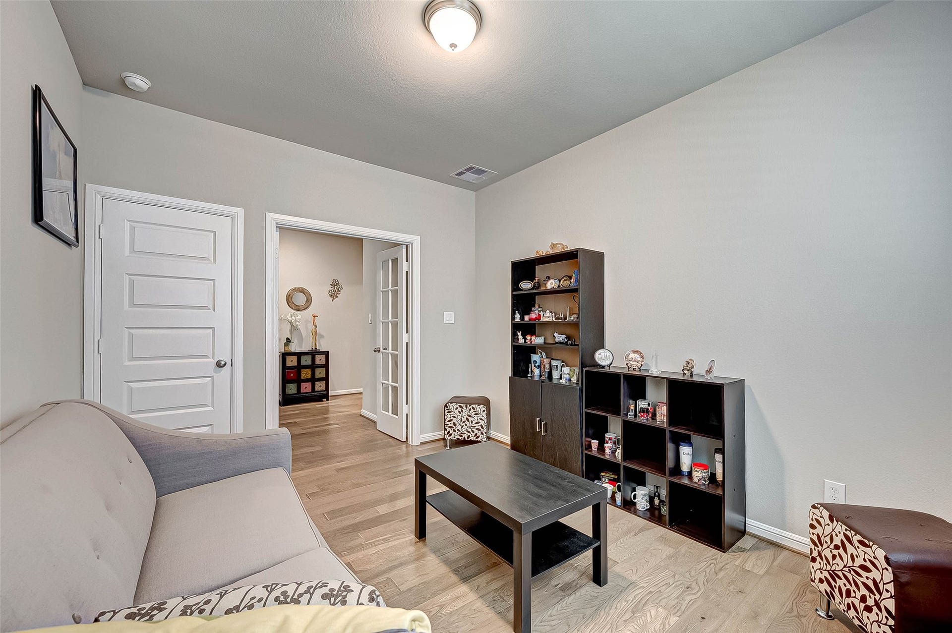 7914 Euphonia Glade Lane, Richmond, TX 77407 Versatile private study with French doorsideal for a home office, hobby room, or additional flex space.