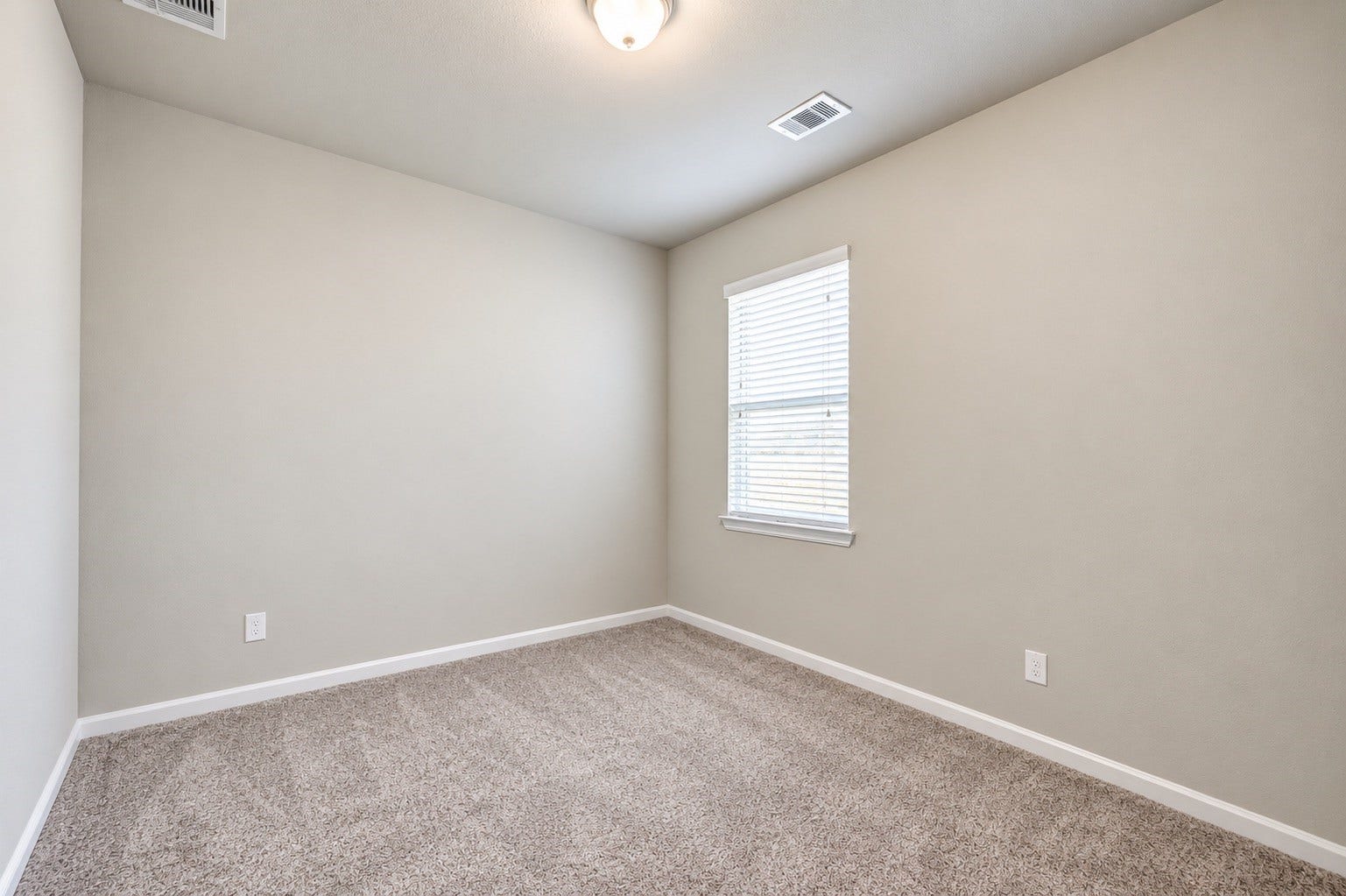 7914 Euphonia Glade Lane, Richmond, TX 77407 Comfortable secondary bedroom with neutral finishes and natural light.