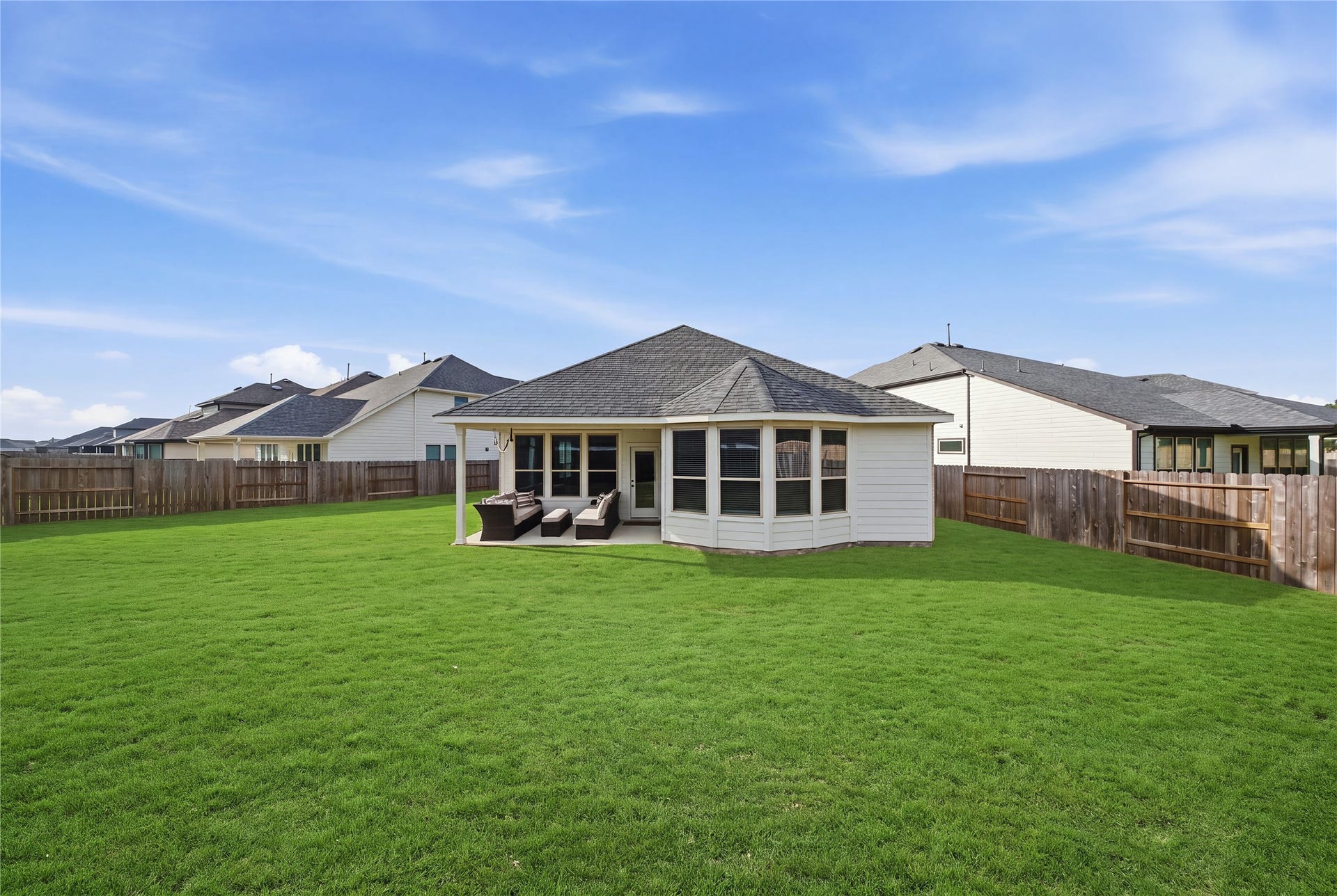 15194 Wild Gully Way, Conroe, TX 77302 Spacious backyard featuring a covered patio and room to create your dream outdoor oasis