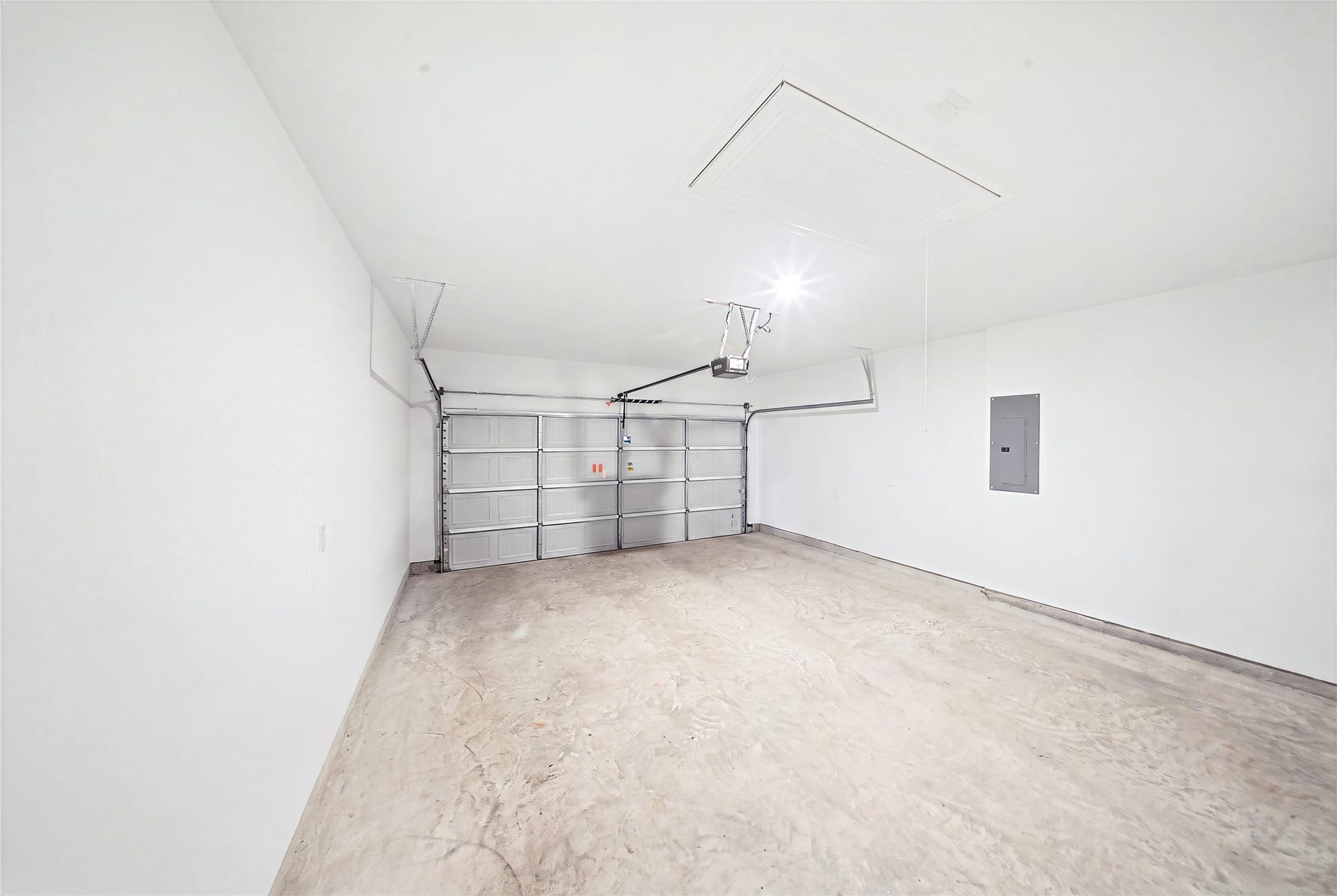 15194 Wild Gully Way, Conroe, TX 77302 Spacious two-car garage offering convenient parking and additional storage