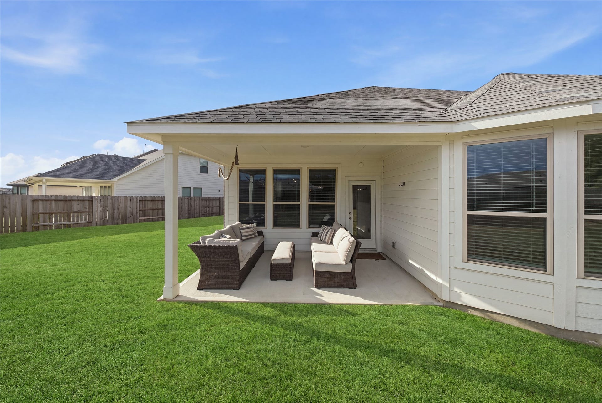 15194 Wild Gully Way, Conroe, TX 77302 Covered patioperfect for relaxing, dining, and outdoor entertaining