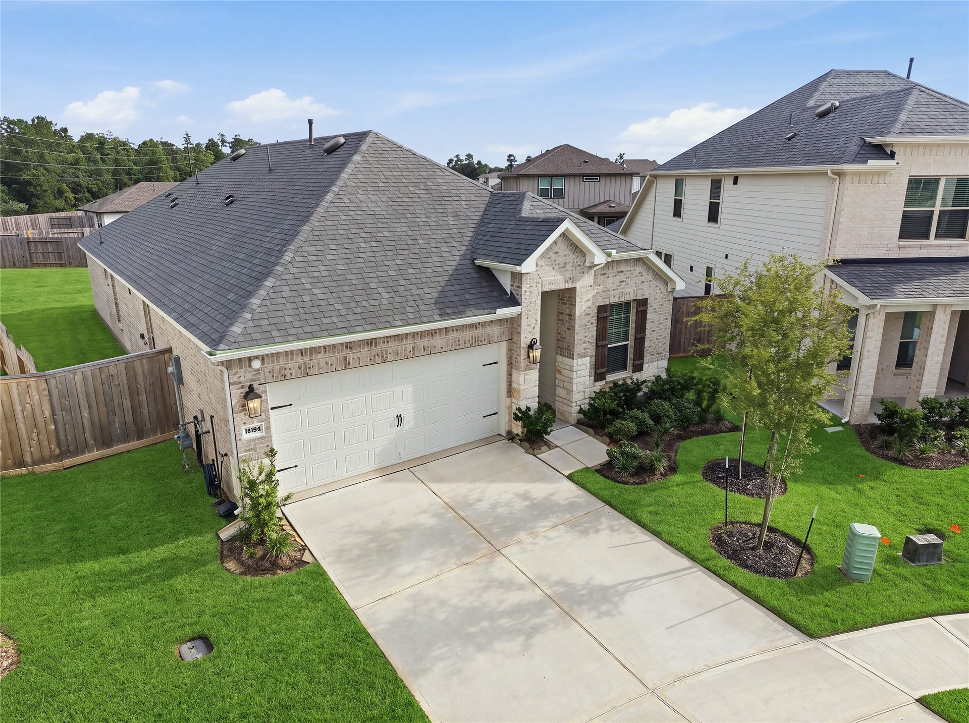 15194 Wild Gully Way, Conroe, TX 77302 Three-Sides Brick Exterior Premium Builder Upgrade