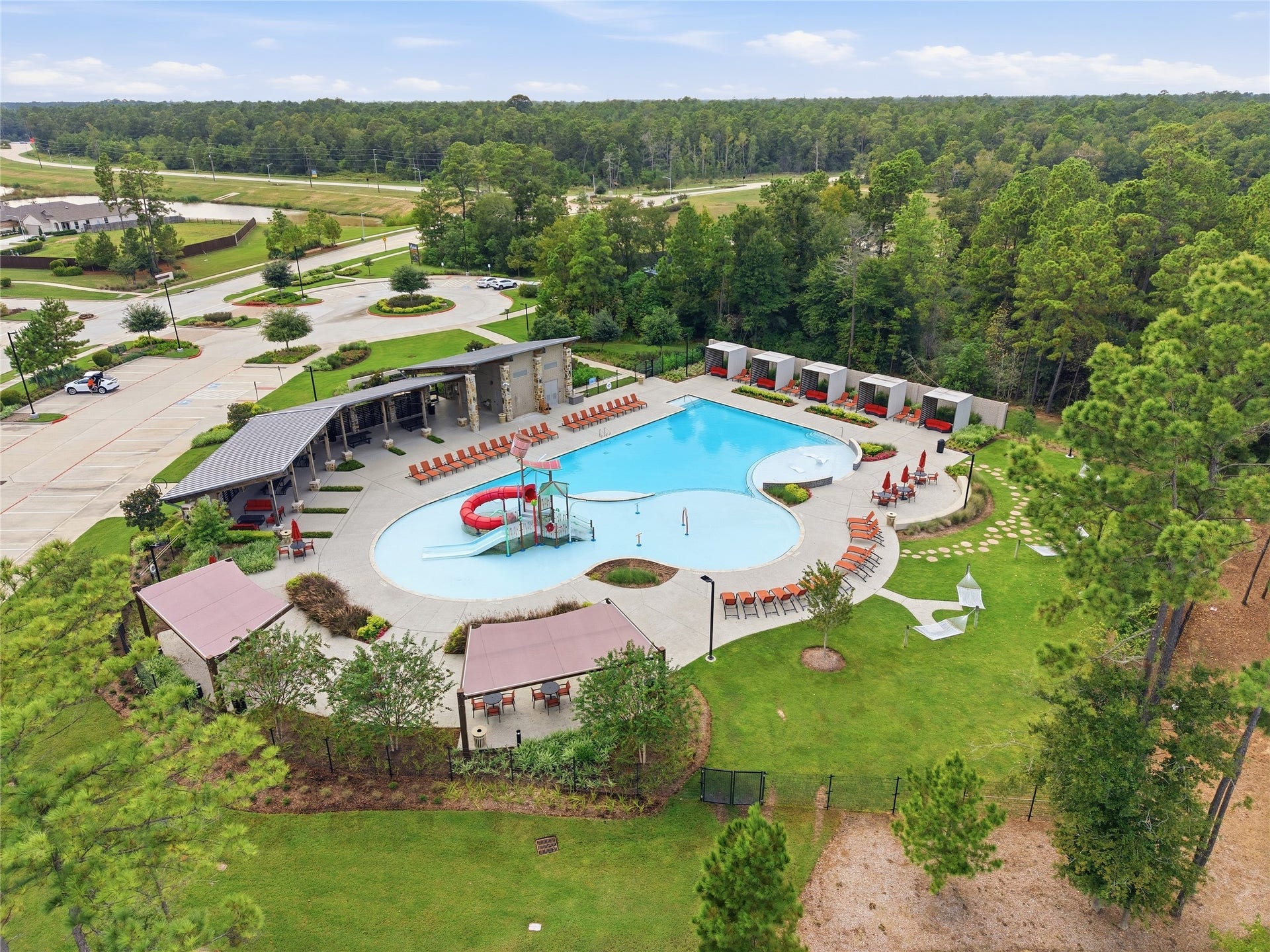15194 Wild Gully Way, Conroe, TX 77302 Enjoy Mavera amenities including pools, playgrounds, parks, trails, tennis courts and recreational spaces.