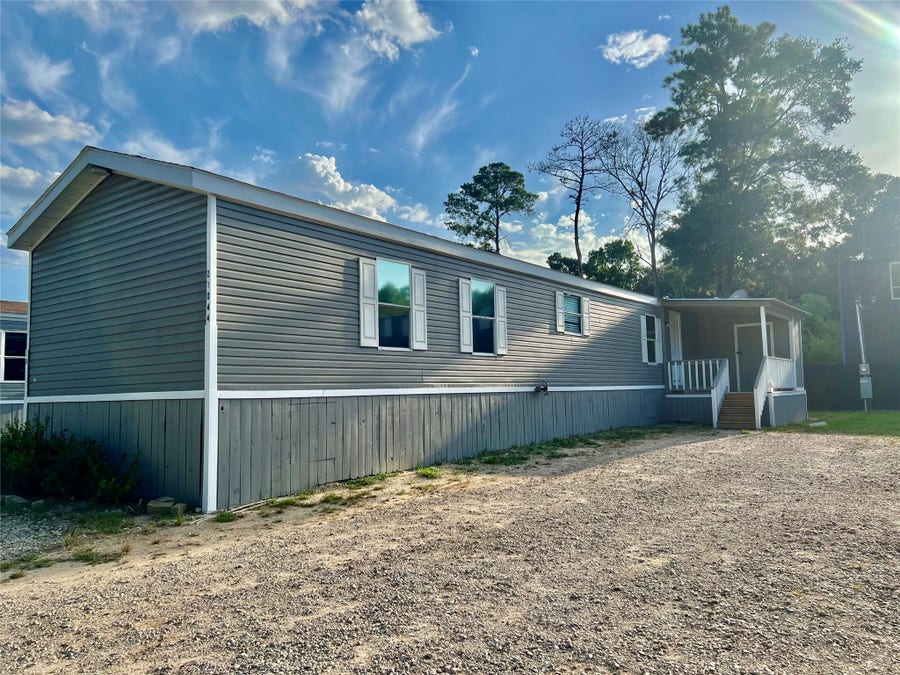 Property photo for 21044 S Sabine Drive, New Caney, TX