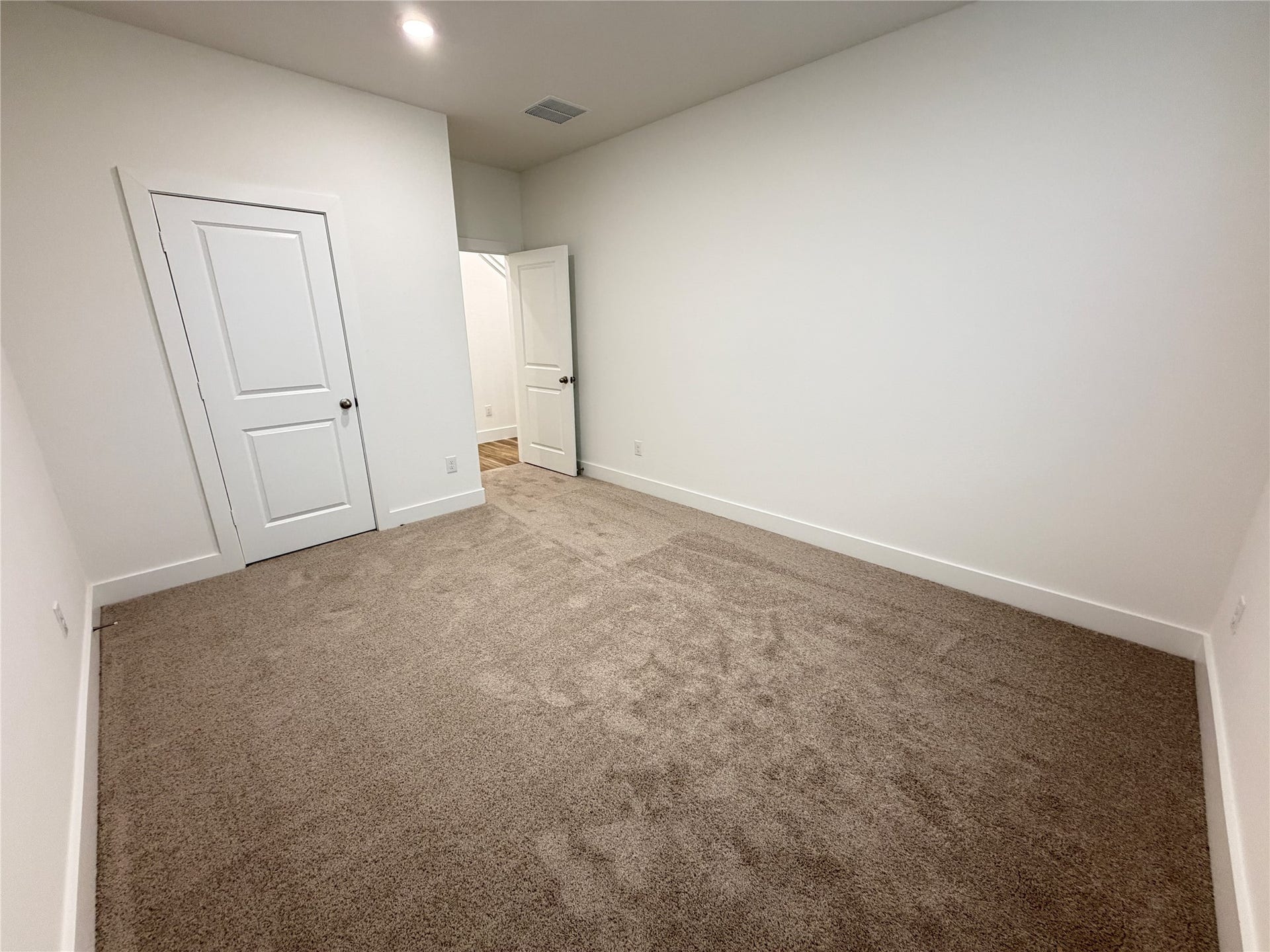 Another guest bedroom also on first floor.