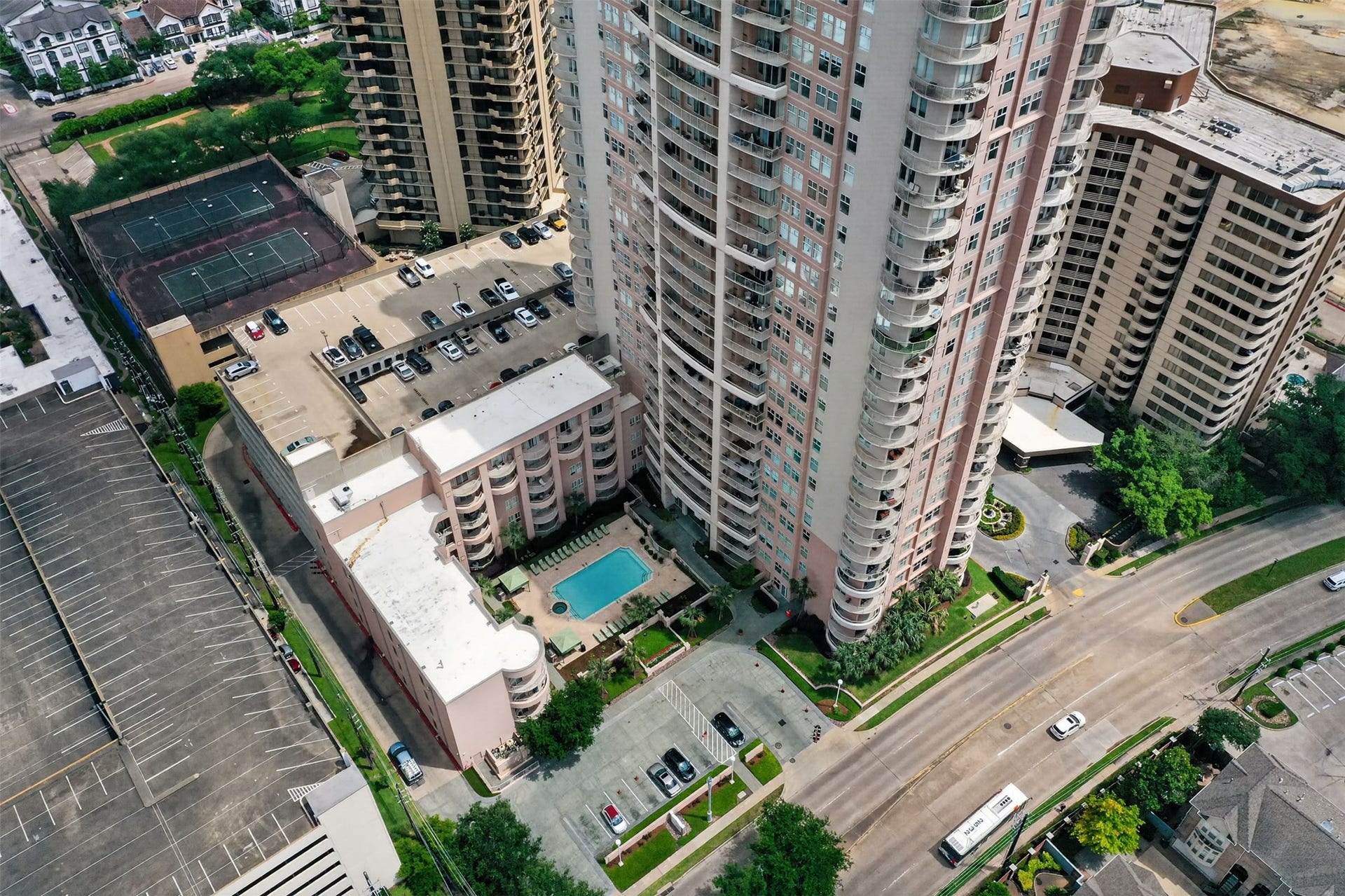 3505 Sage Road, #314, Houston, TX 77056 High-rise living at its finest, this condominium offers stunning views, a pristine swimming pool, and convenient access to tennis courts. Secure parking and lush landscaping enhance the urban lifestyle.