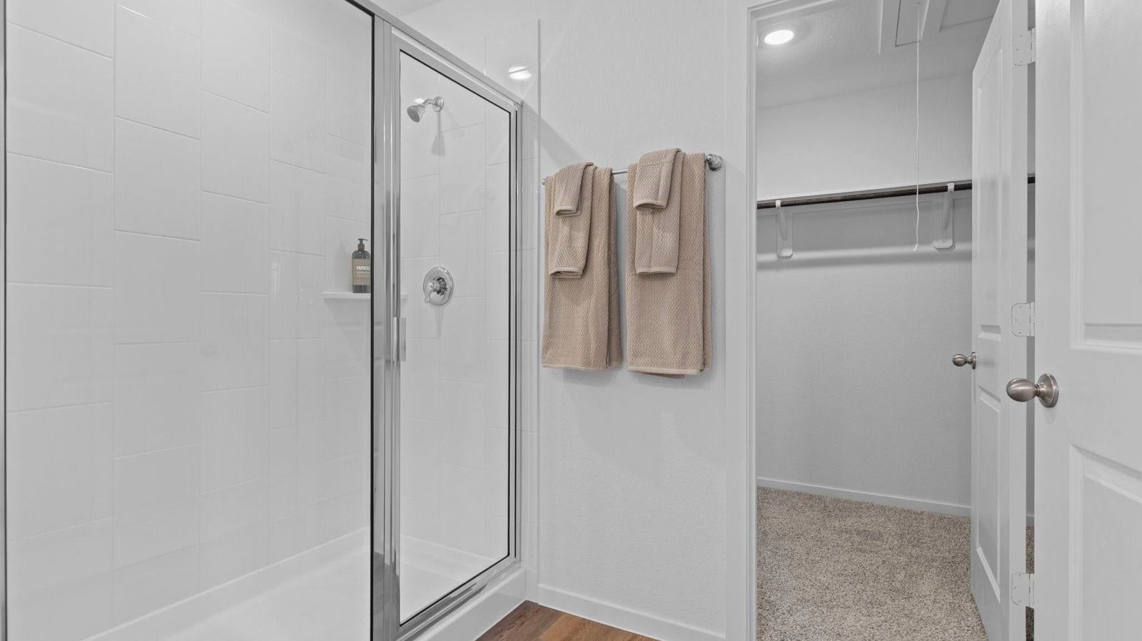 3505 Horseshoe Trail Road, League City, TX 77511 Primary bathroom with a glass-enclosed standing shower and separate soaking tub.