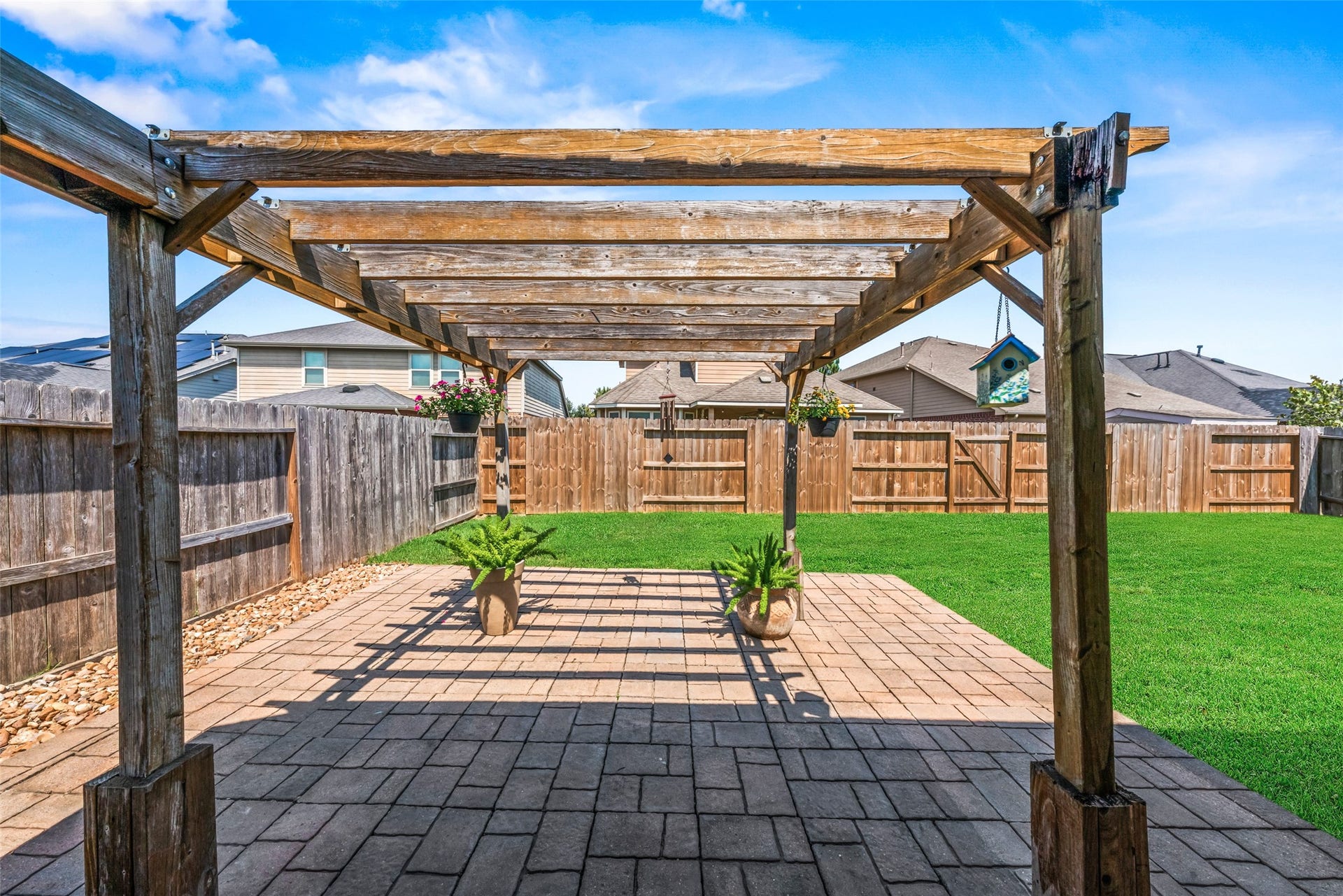Pretty pergola for added space.