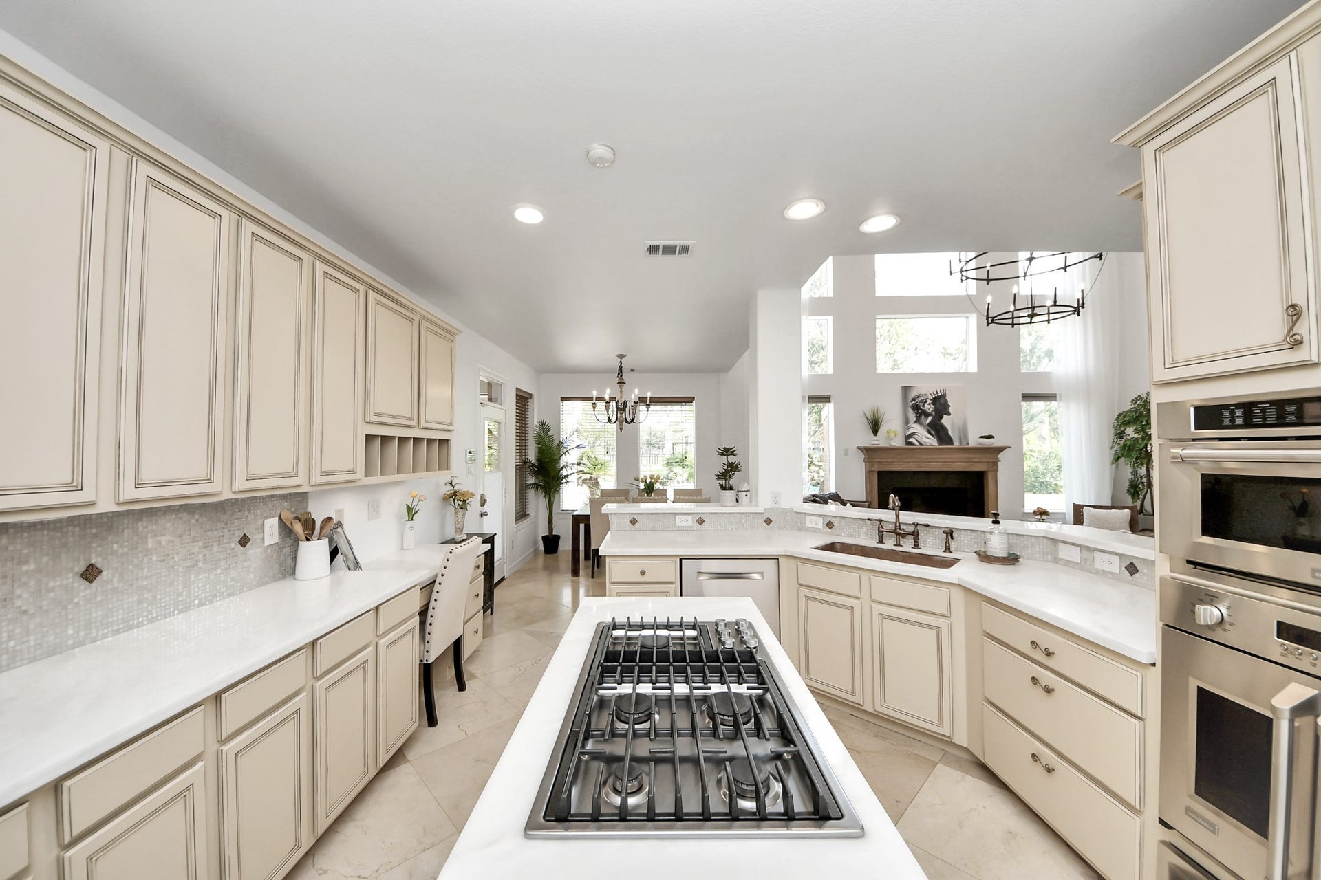 3903 Indian Point, Missouri City, TX 77459 Island kitchen with professional appliances including a french-door oven, convection oven microwave, and warming drawer