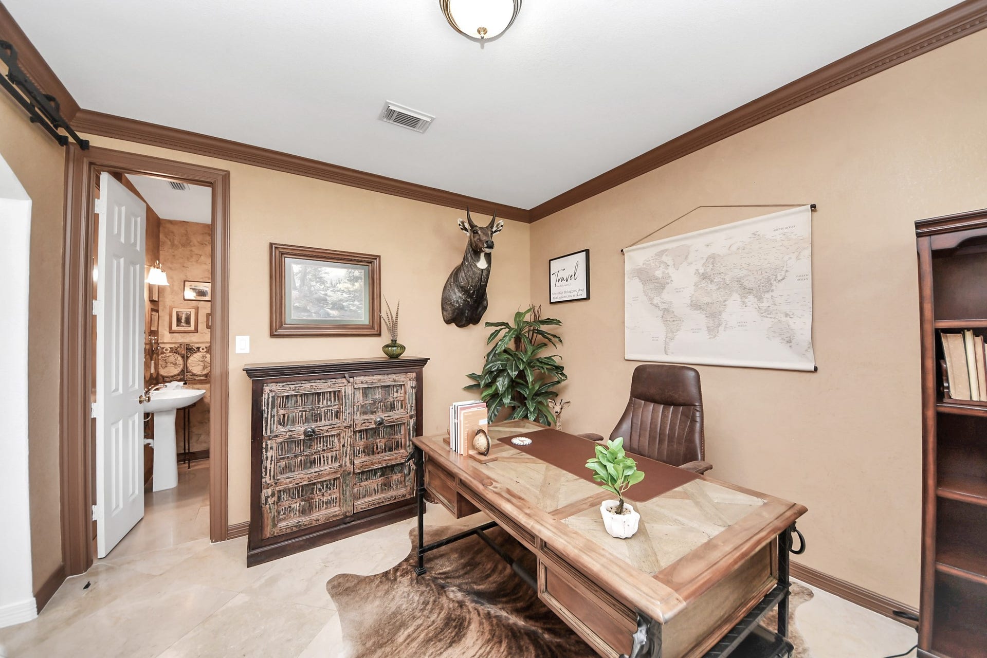 3903 Indian Point, Missouri City, TX 77459 Home office/study with half bath connected, which is pre-plumbed to allow for conversion to a full bath, per seller
