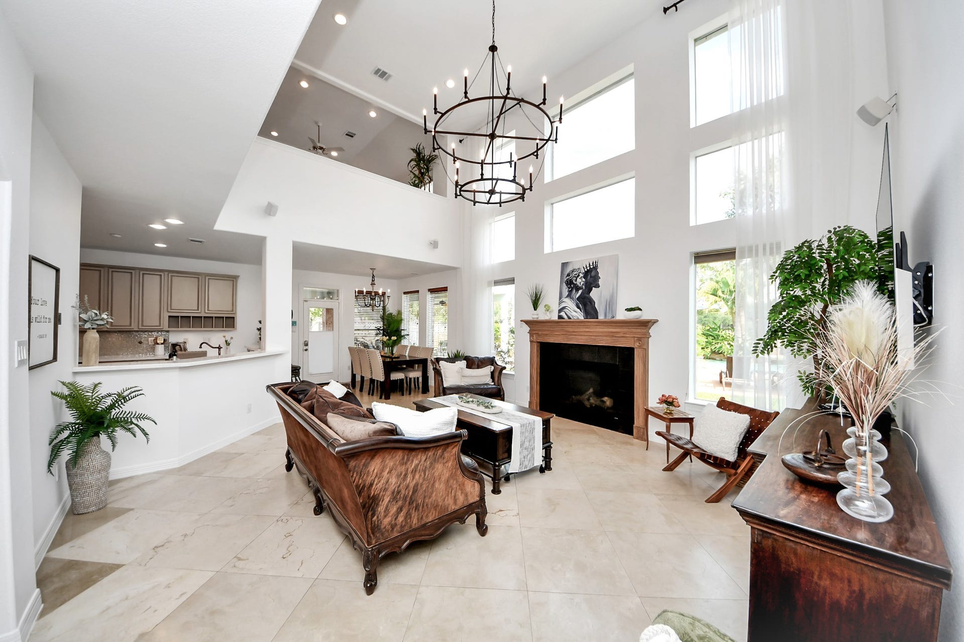 3903 Indian Point, Missouri City, TX 77459 Family room with tall ceilings, plentiful light, and a gorgeous view of the back yard resort
