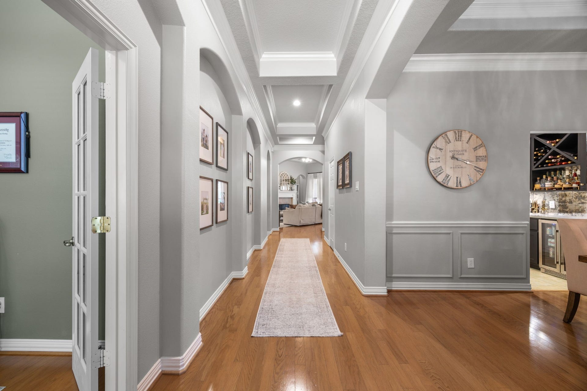 26823 Sandy Arbor Lane, Katy, TX 77494 From the moment you enter, hardwood floors, architectural arches, extensive millwork and detailed ceiling treatments introduce the character found throughout the home.