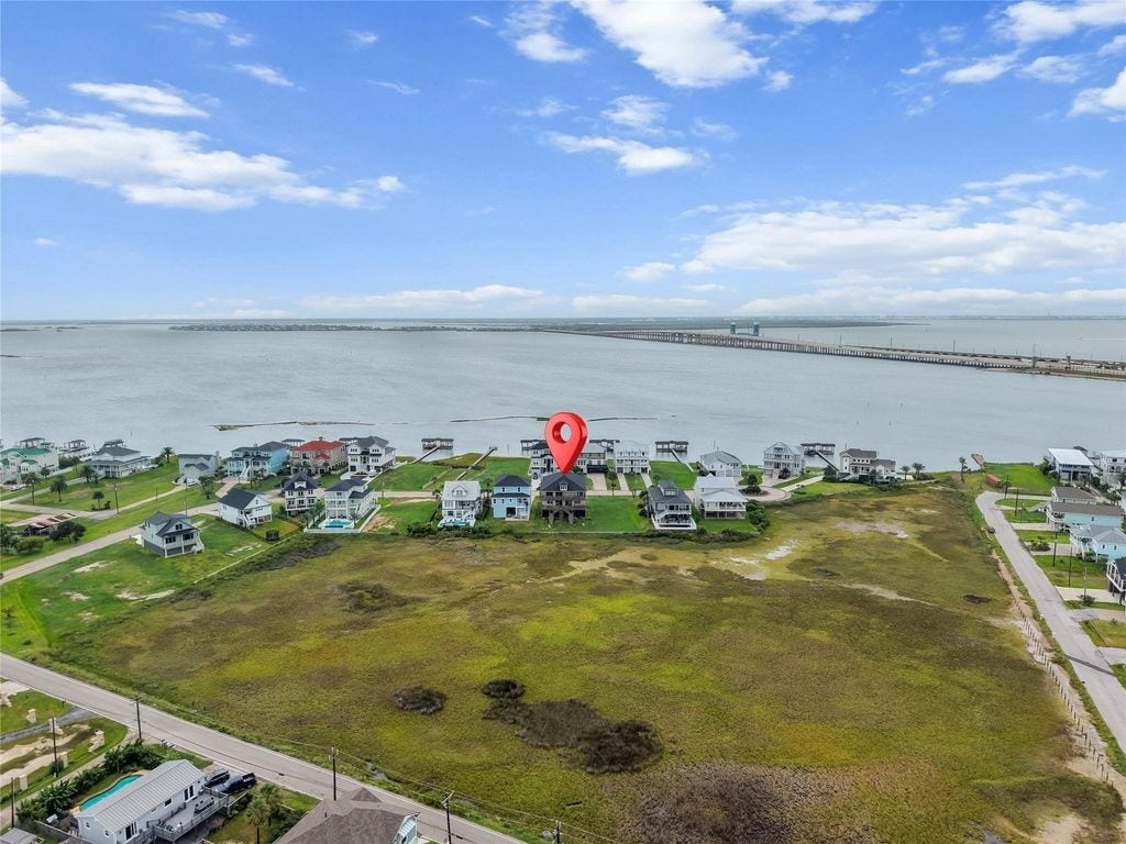 9305 Vista Bella, Galveston, TX 77554 This Home sits On a penisula on the cl;ean side of Galvaston Island safe from the storms