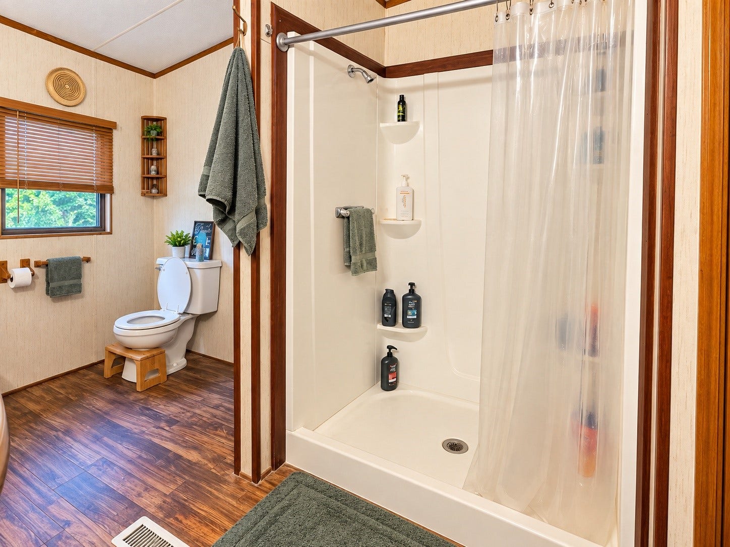Virtually Edited  Primary Bathroom: Additional view of the primary bathroom highlighting the separate walk-in shower and spacious layout.