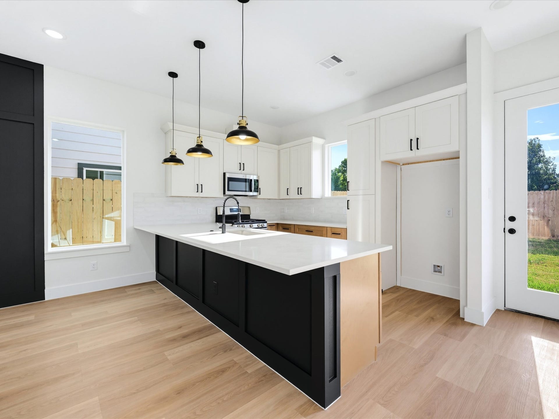 9119 Henrietta Street, #A/B, Houston, TX 77088 Huge kitchen island for plenty of seating for dining.