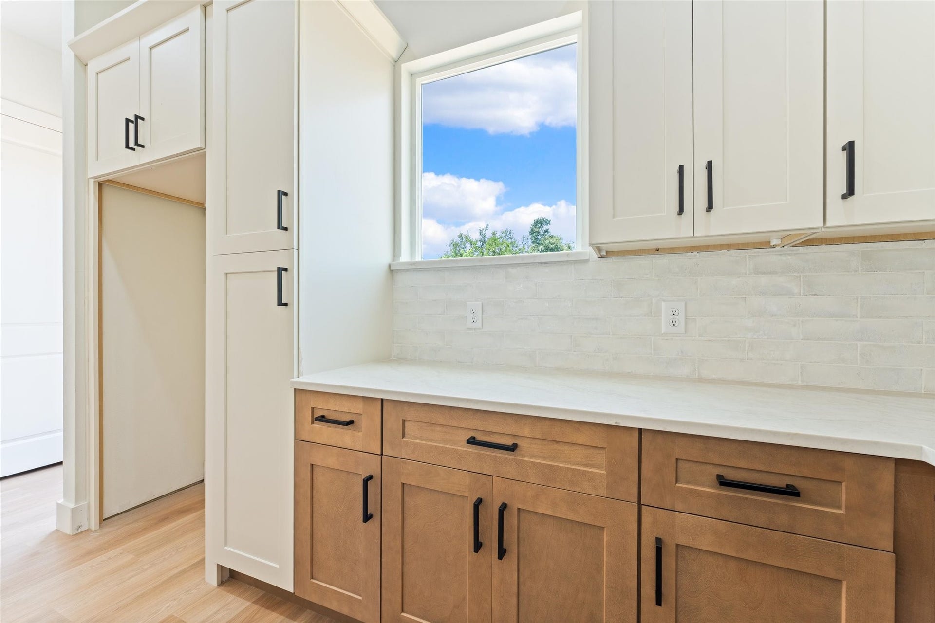 9119 Henrietta Street, #A/B, Houston, TX 77088 A convenient built in refrigerator space and additional countertop area make the perfect
spot for a coffee station or serving area.