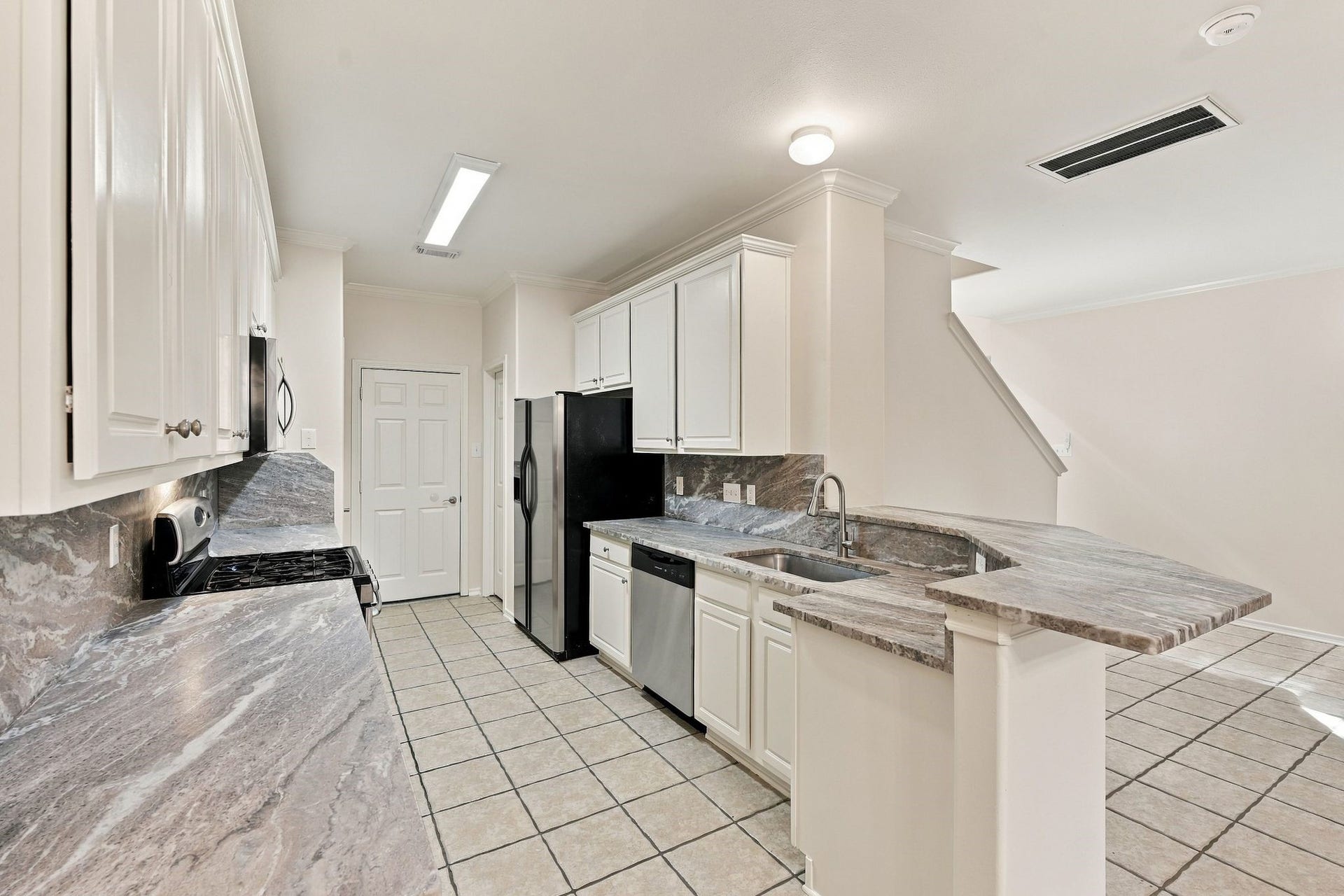 142 N Camellia Grove Circle, The Woodlands, TX 77382 Be the first to enjoy these newly installed luxury granite counters, microwave, dishwasher and sink. The cabinets have just been painted, and there are two large pantries that offer a significant amount of storage.