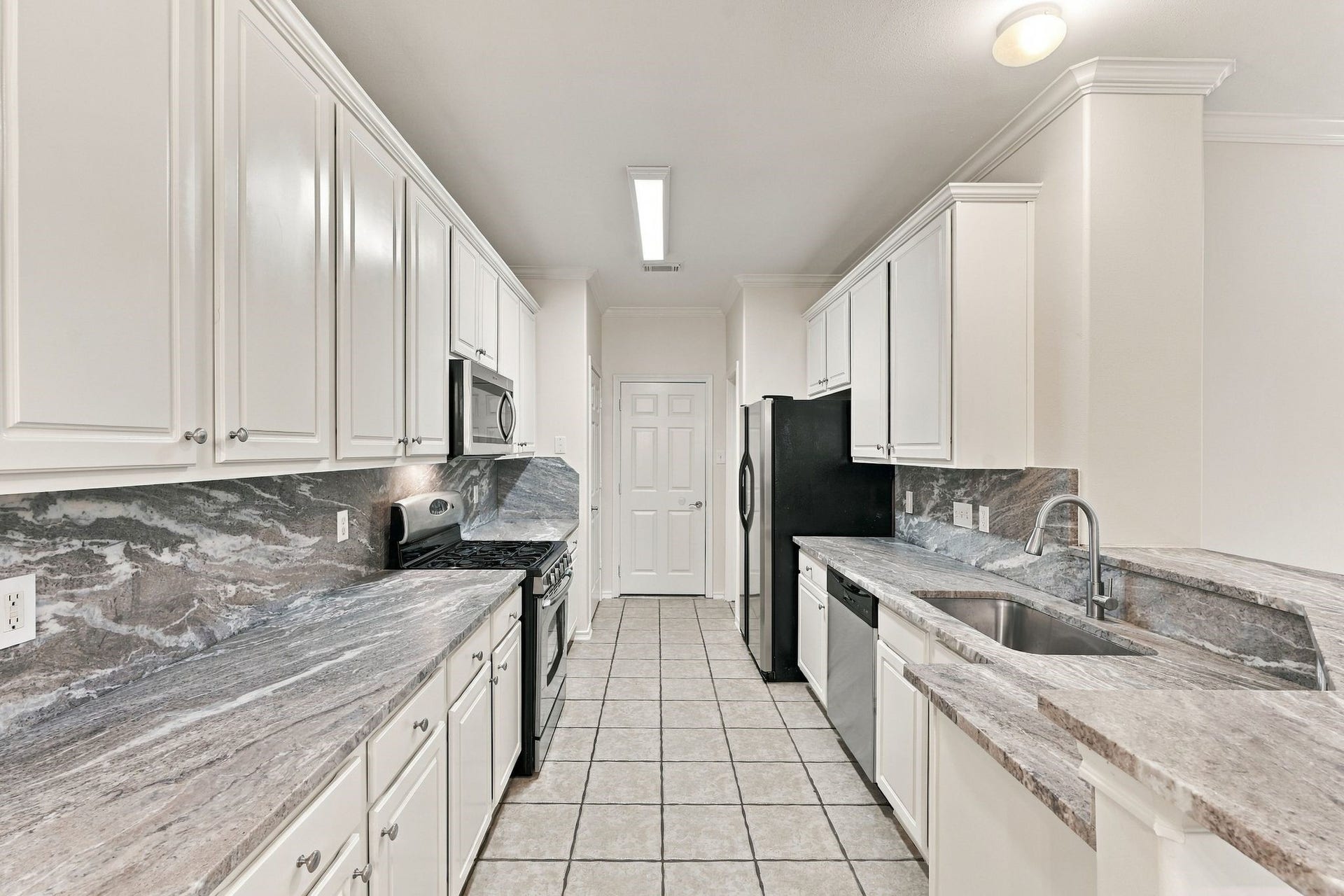 142 N Camellia Grove Circle, The Woodlands, TX 77382 Be the first to enjoy these newly installed luxury granite counters, microwave, dishwasher and sink. The cabinets have just been painted, and there are two large pantries that offer a significant amount of storage.