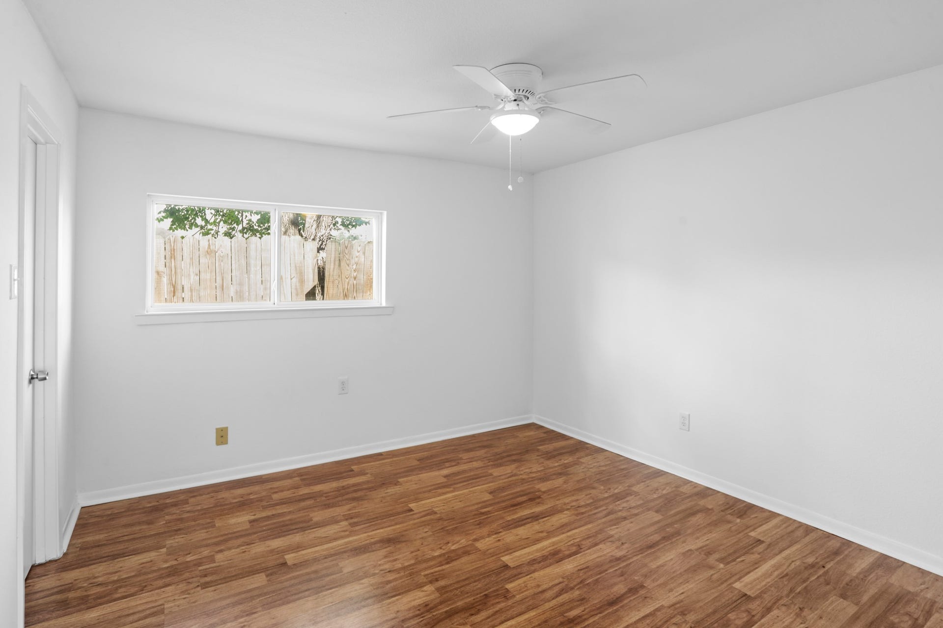 1408 Hughes Street, #11, Houston, TX 77023 Notice the recently updated bedroom double paned window and ceiling fan for cool sleeping.