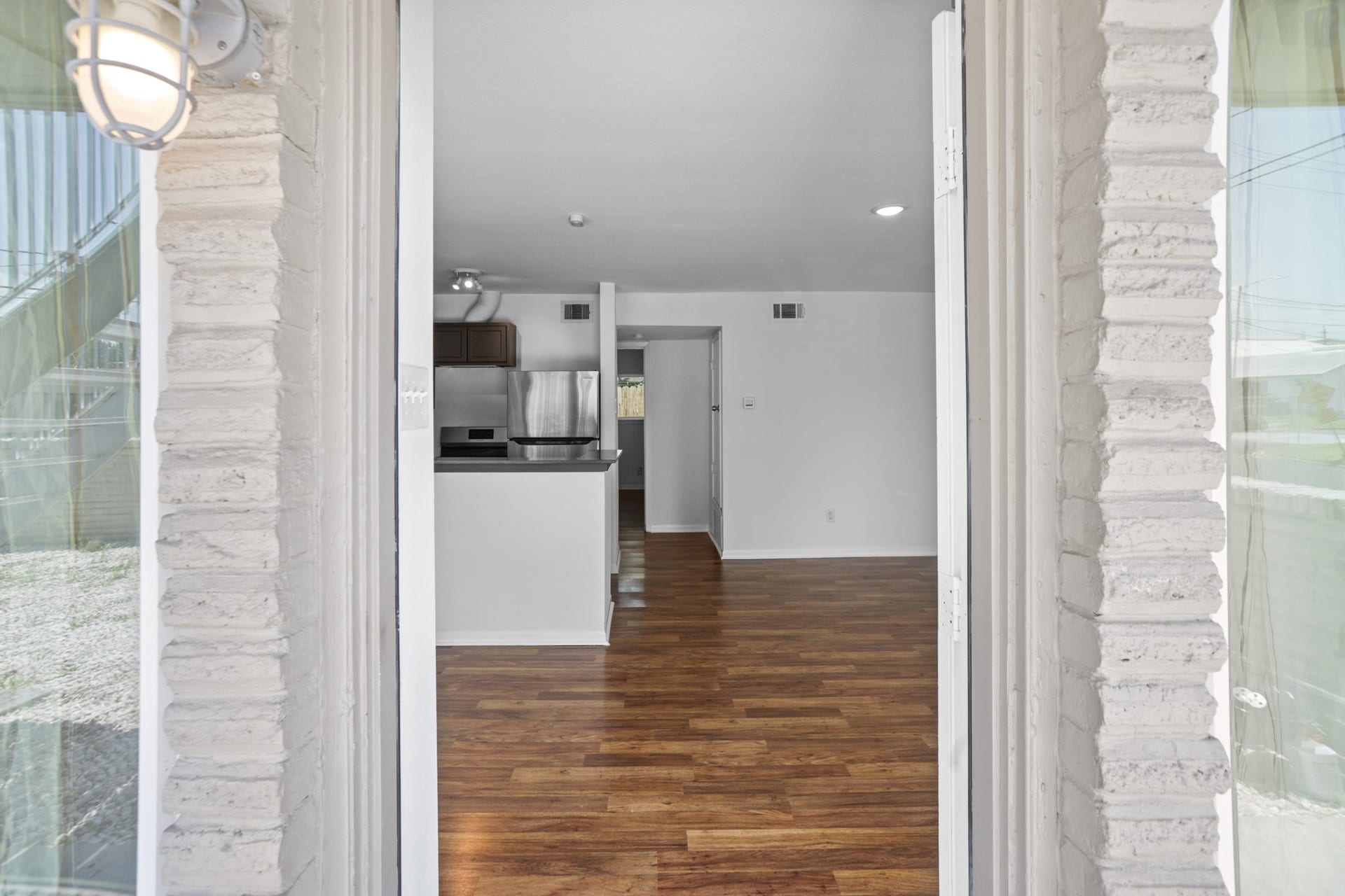1408 Hughes Street, #11, Houston, TX 77023 The view as you enter the apartment. Living, dining and kitchen are all open for seemless flow.
