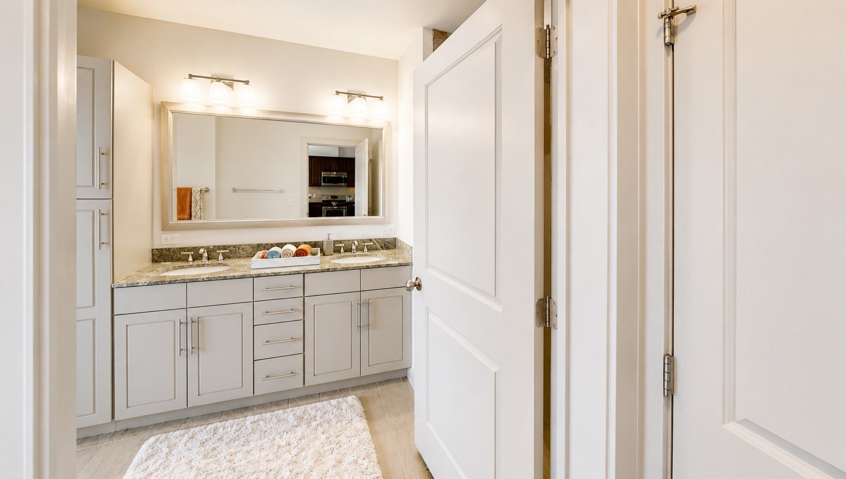 Storage is definitely not an issue here. The extended vanity and built-in cabinetry give you plenty of space to keep everything organized and within reach.