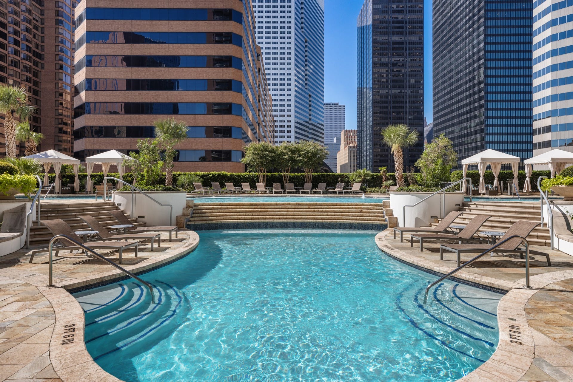 Inspired by the ambiance of a world-class resort, the expansive pool features multiple lounging areas, cascading water features, and private cabanas that create the perfect setting for relaxing under the Houston sun. Every detail is designed to deliver a true luxury lifestyle.