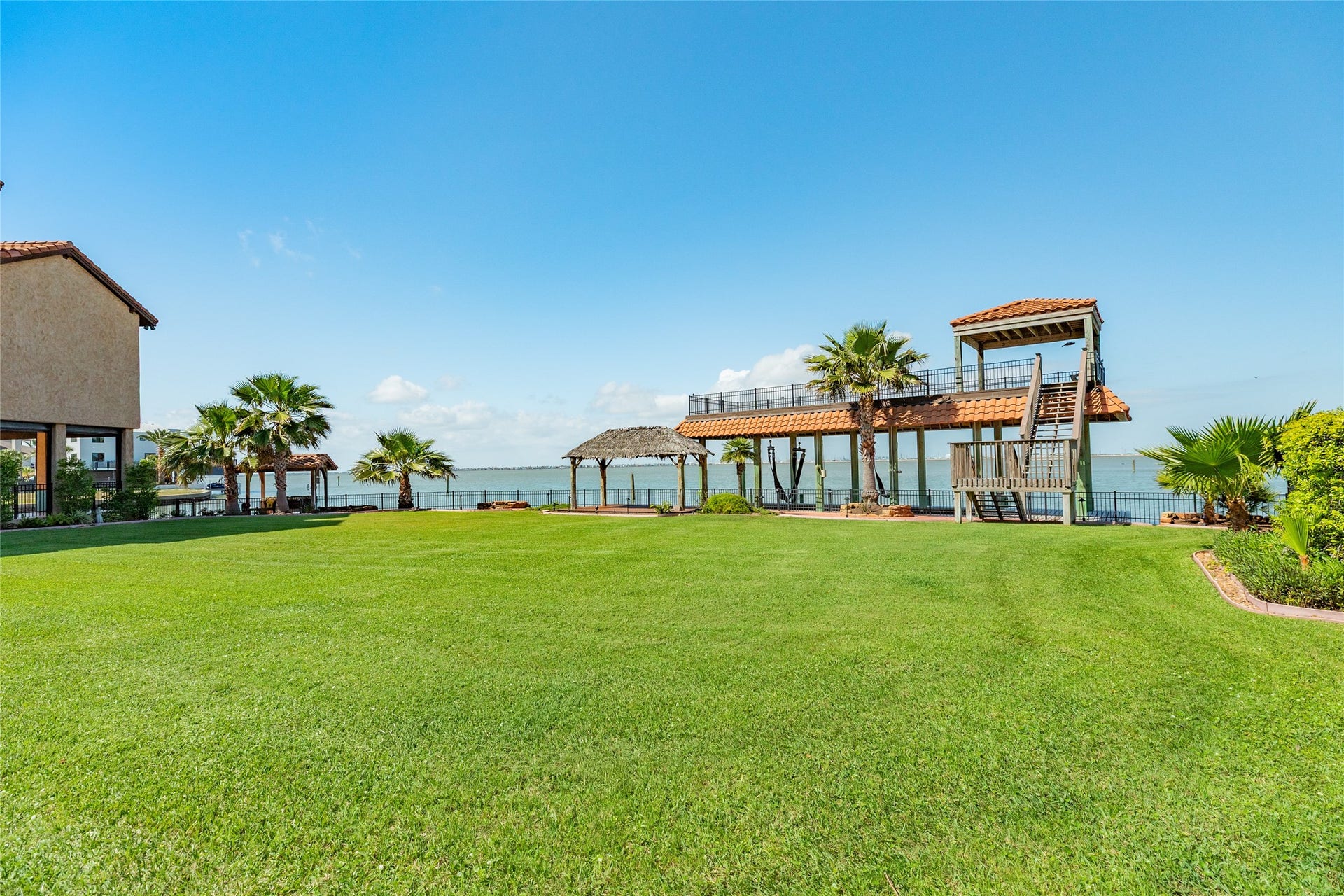 506 Sunset Circle, Tiki Island, TX 77554 Two lots next door, Lot 15 & 16, with option to be purchased separately from listed property