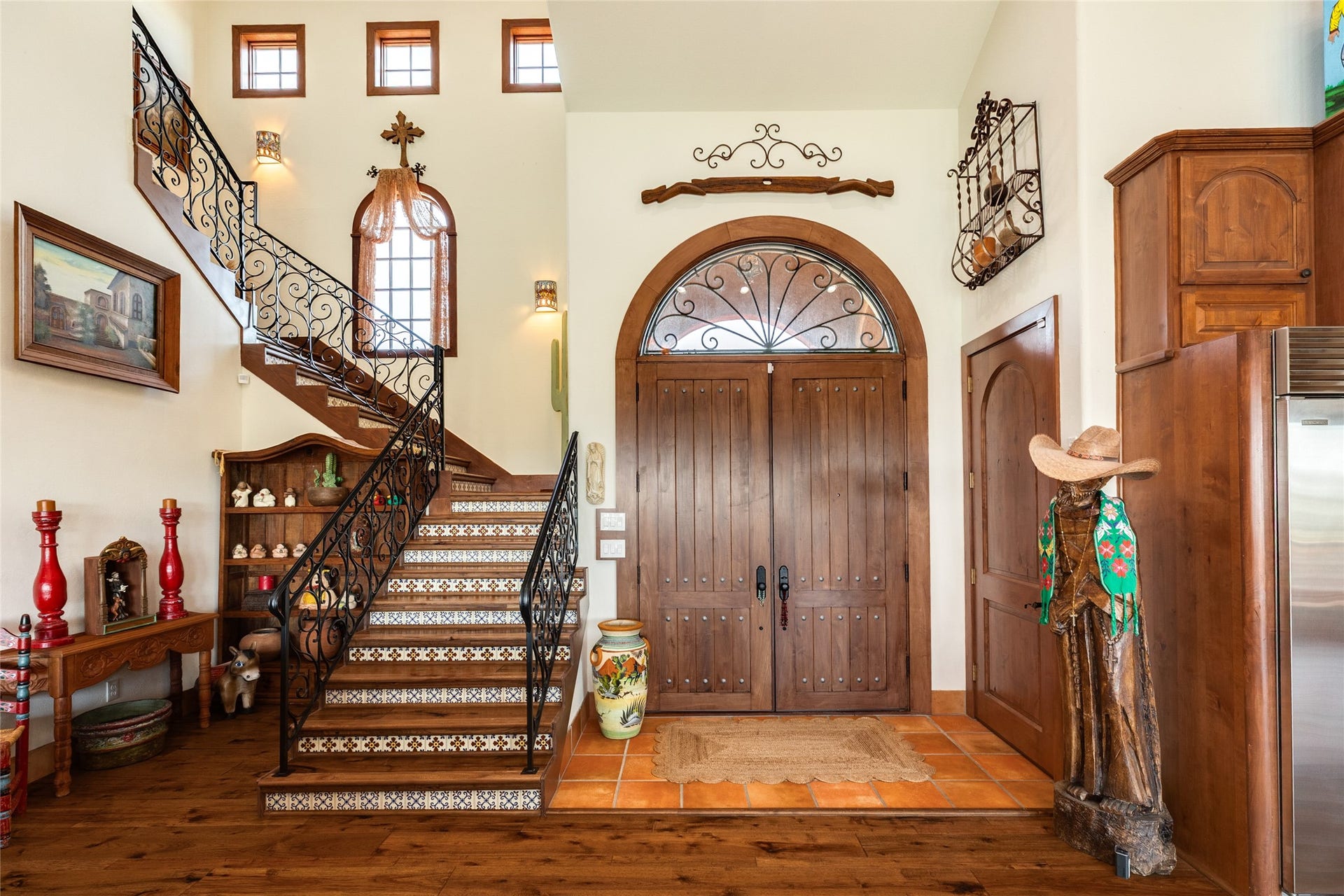 506 Sunset Circle, Tiki Island, TX 77554 Front door and beautiful Spanish style steps with mexican tile inserts
