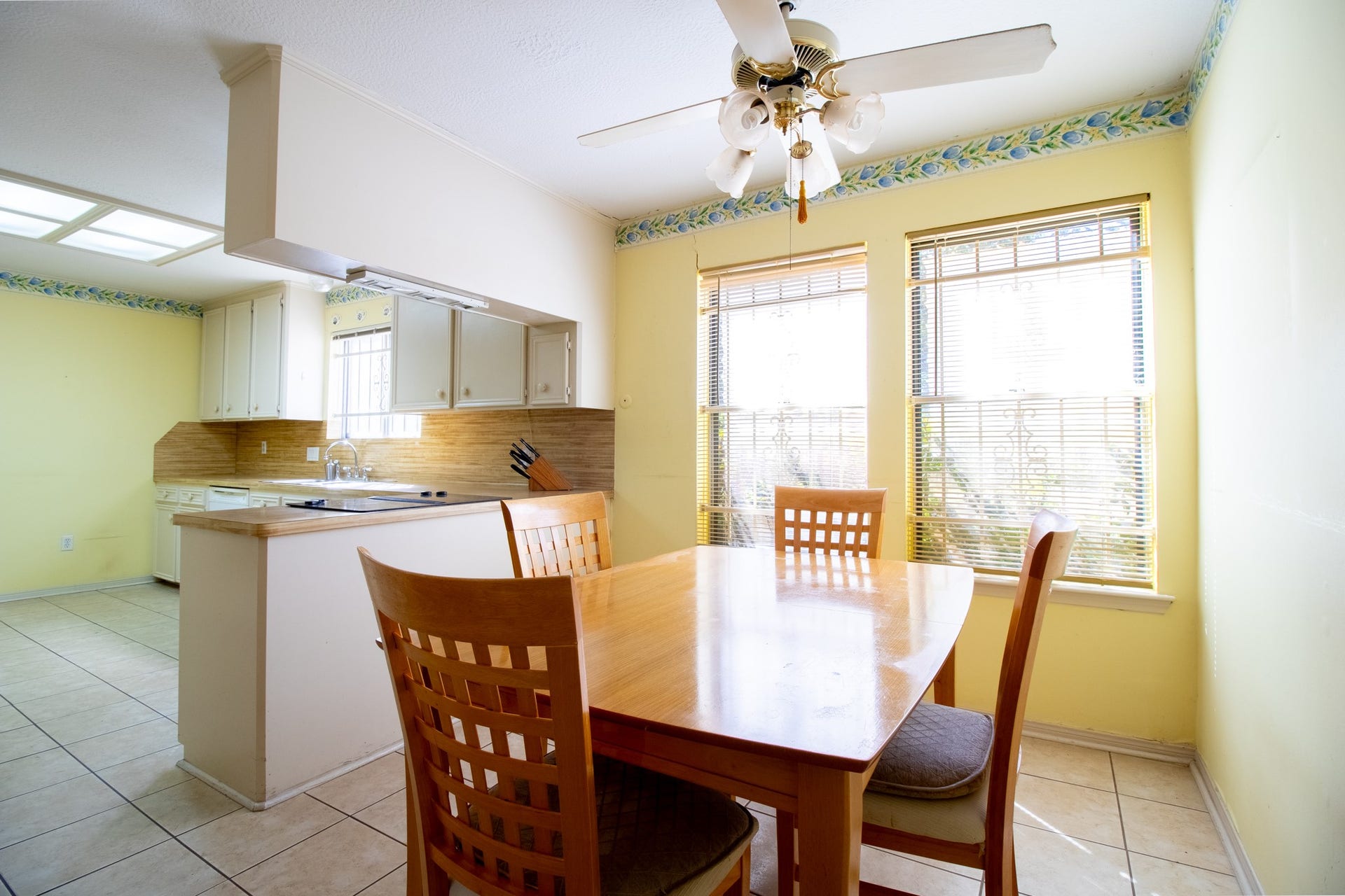 A cheerful place for quick meals, homework, or coffee before the day begins, make this space your own!