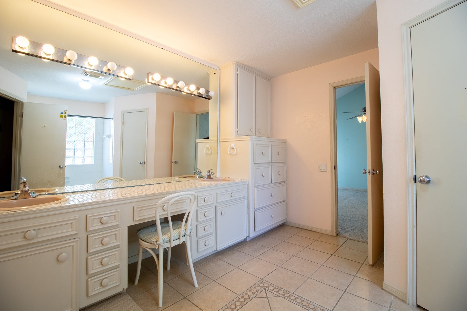 Imagine designing your own personal bathroom retreat, starting with this expansive vanity and generous storage.