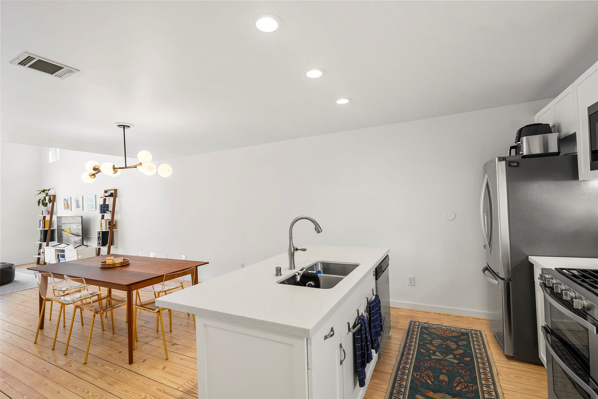 Another view of the kitchen. Fresh with lots of natural light