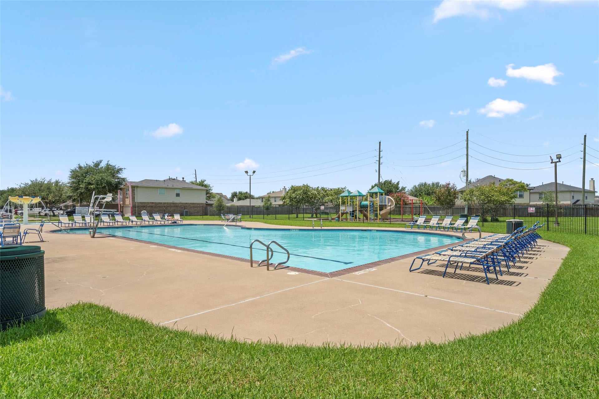 9423 Mineral Rock Lane, Richmond, TX 77407 Dive into relaxation and fun at this inviting community pool, perfect for unwinding and enjoying sunny days with family and friends.