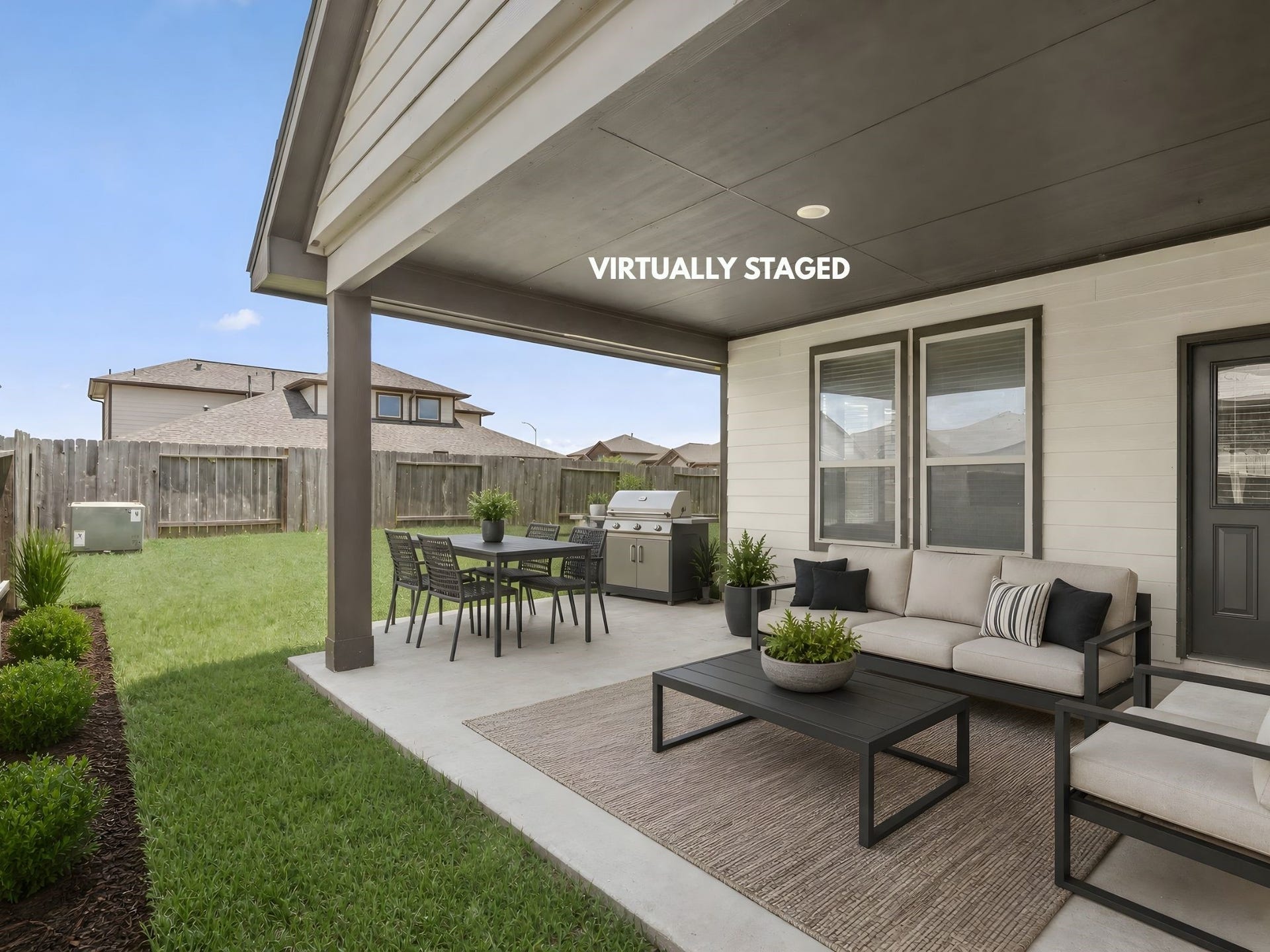 9423 Mineral Rock Lane, Richmond, TX 77407 Experience outdoor living at its finest with this inviting covered patio, beautifully virtually staged for relaxation and entertainment.
