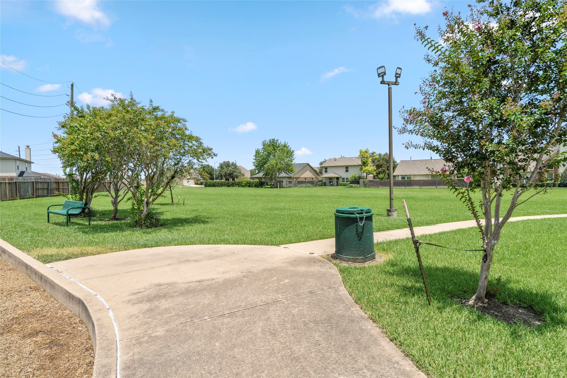 9423 Mineral Rock Lane, Richmond, TX 77407 Enjoy serene walking and jogging trails that wind through lush green spaces, perfect for outdoor enthusiasts and those seeking a peaceful retreat.