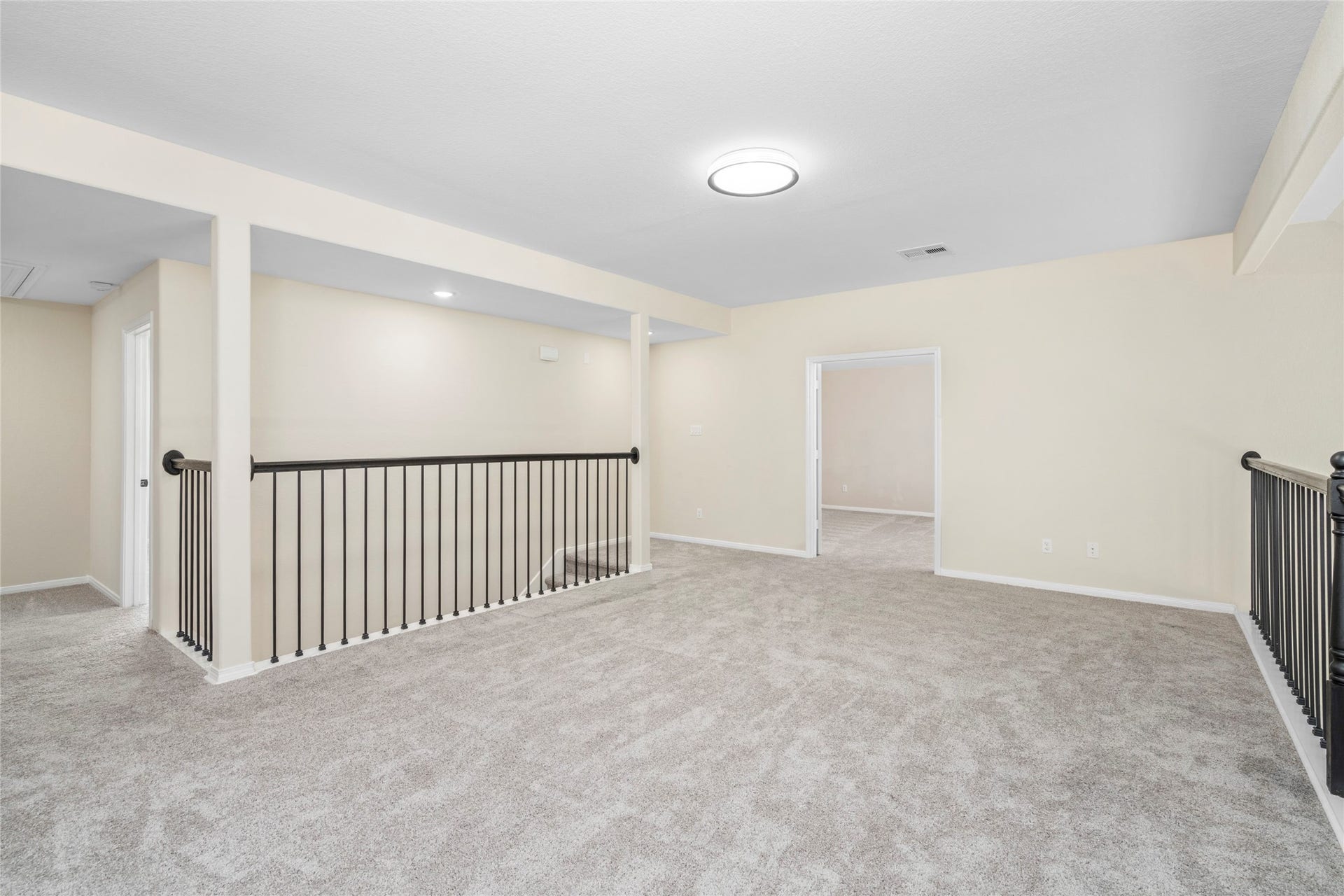 9423 Mineral Rock Lane, Richmond, TX 77407 Elevate your entertainment experience in this spacious second-floor game room, perfect for family fun and relaxation.